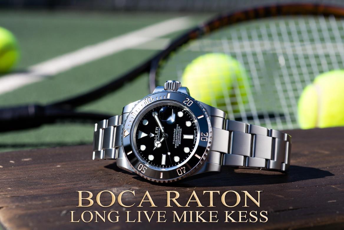 A watch and a tennis racket