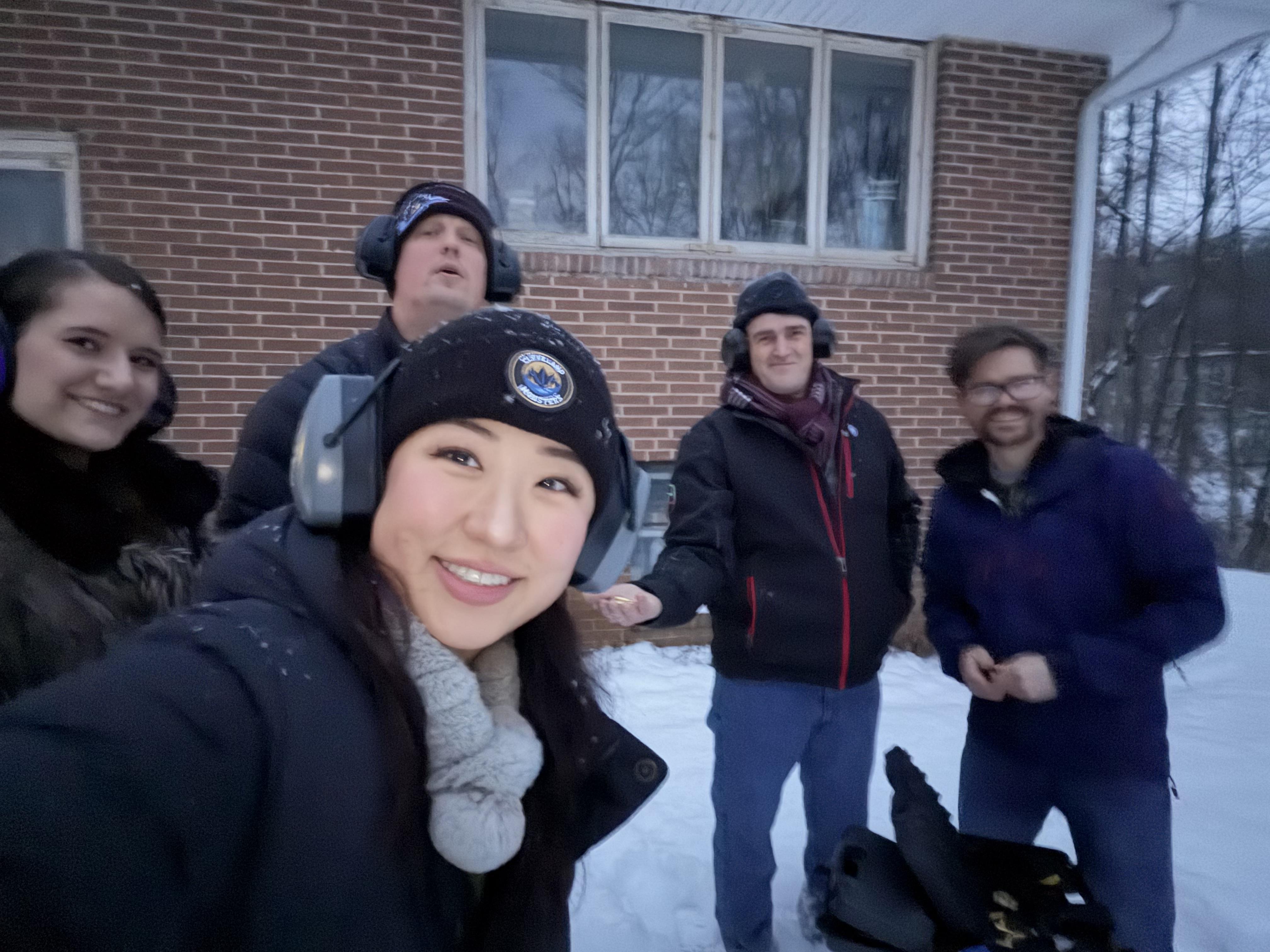 A group of people outside in the snow