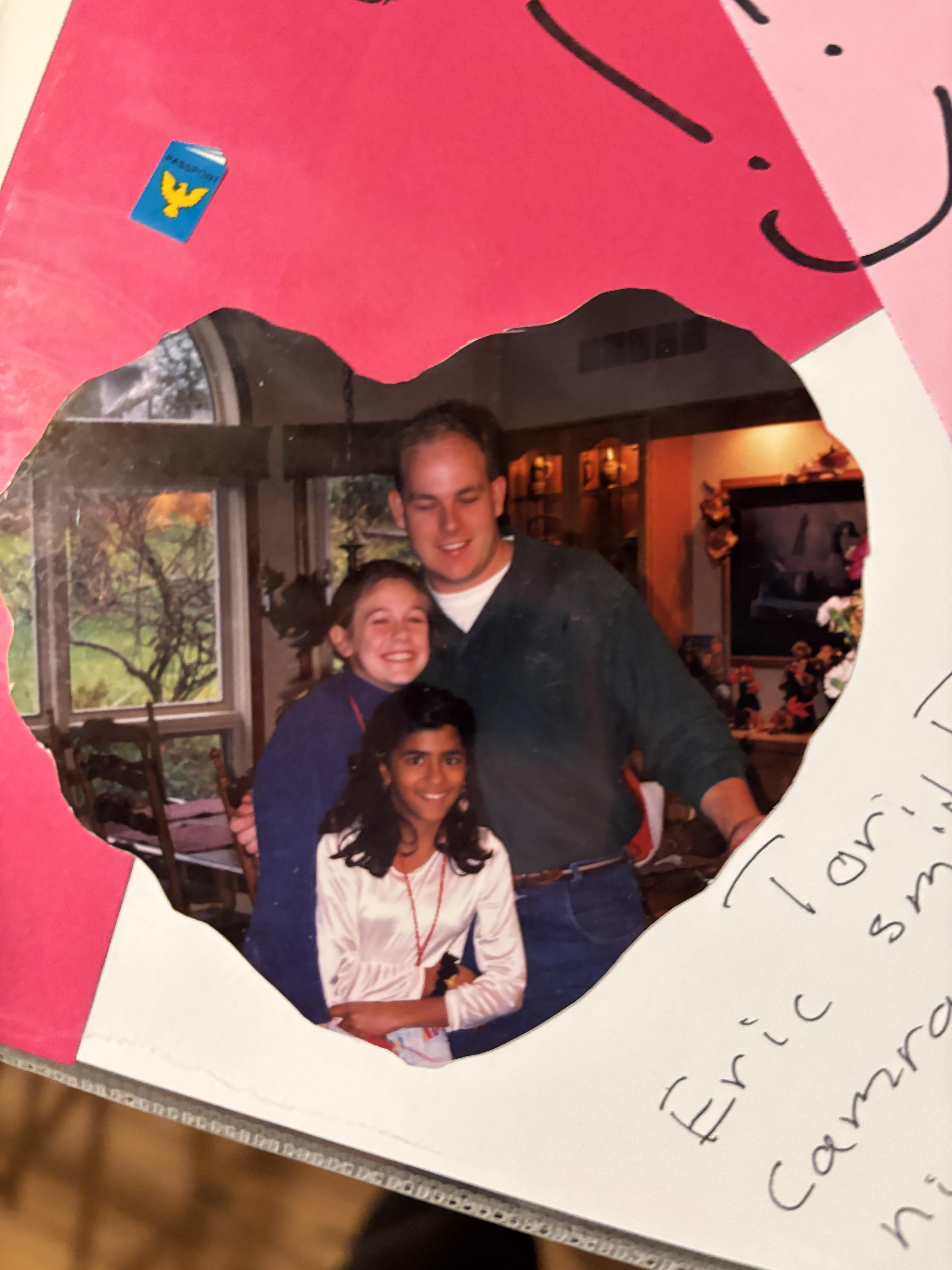 A man and two girls posing for a picture
