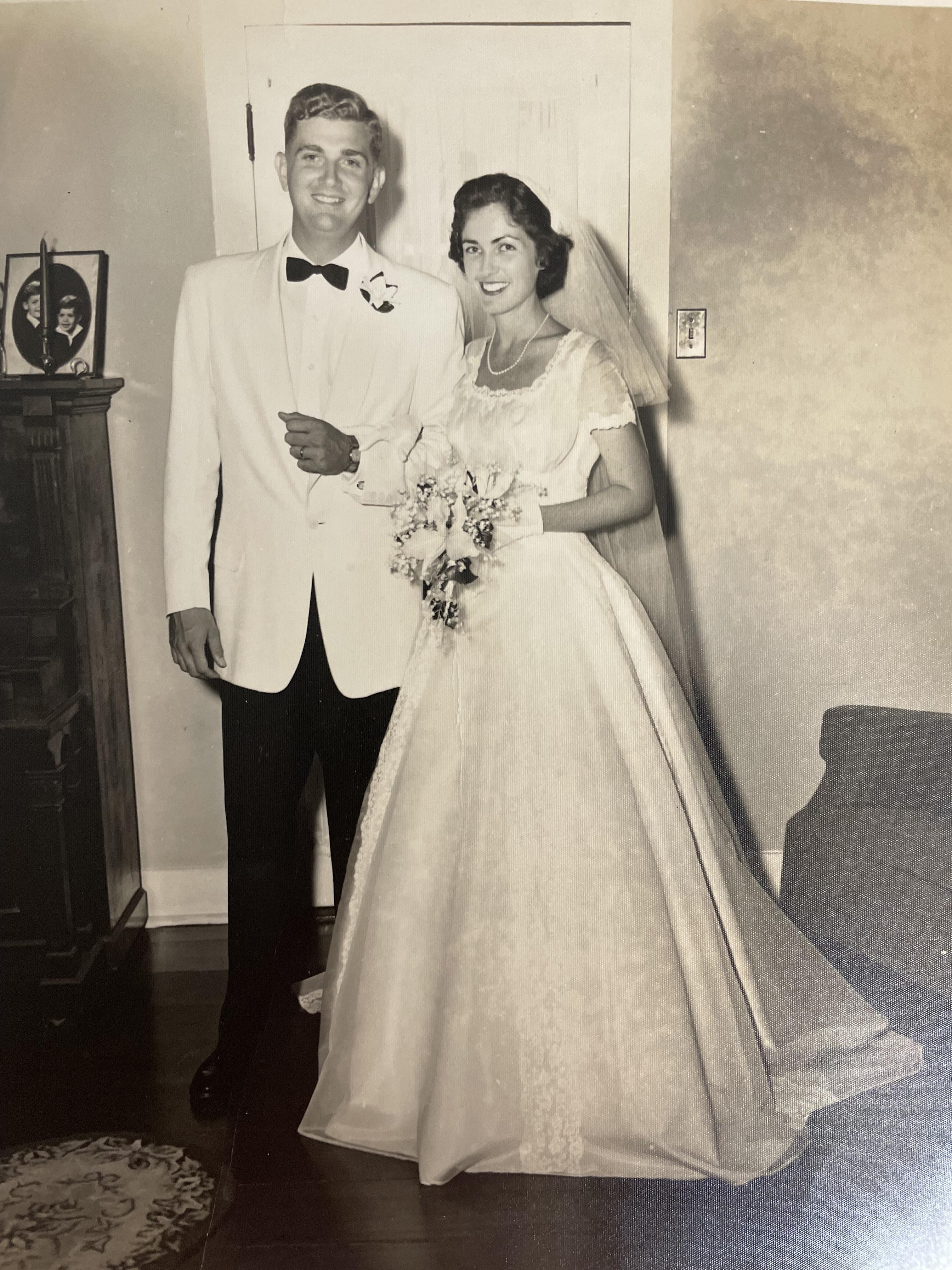 A man and woman in wedding attire