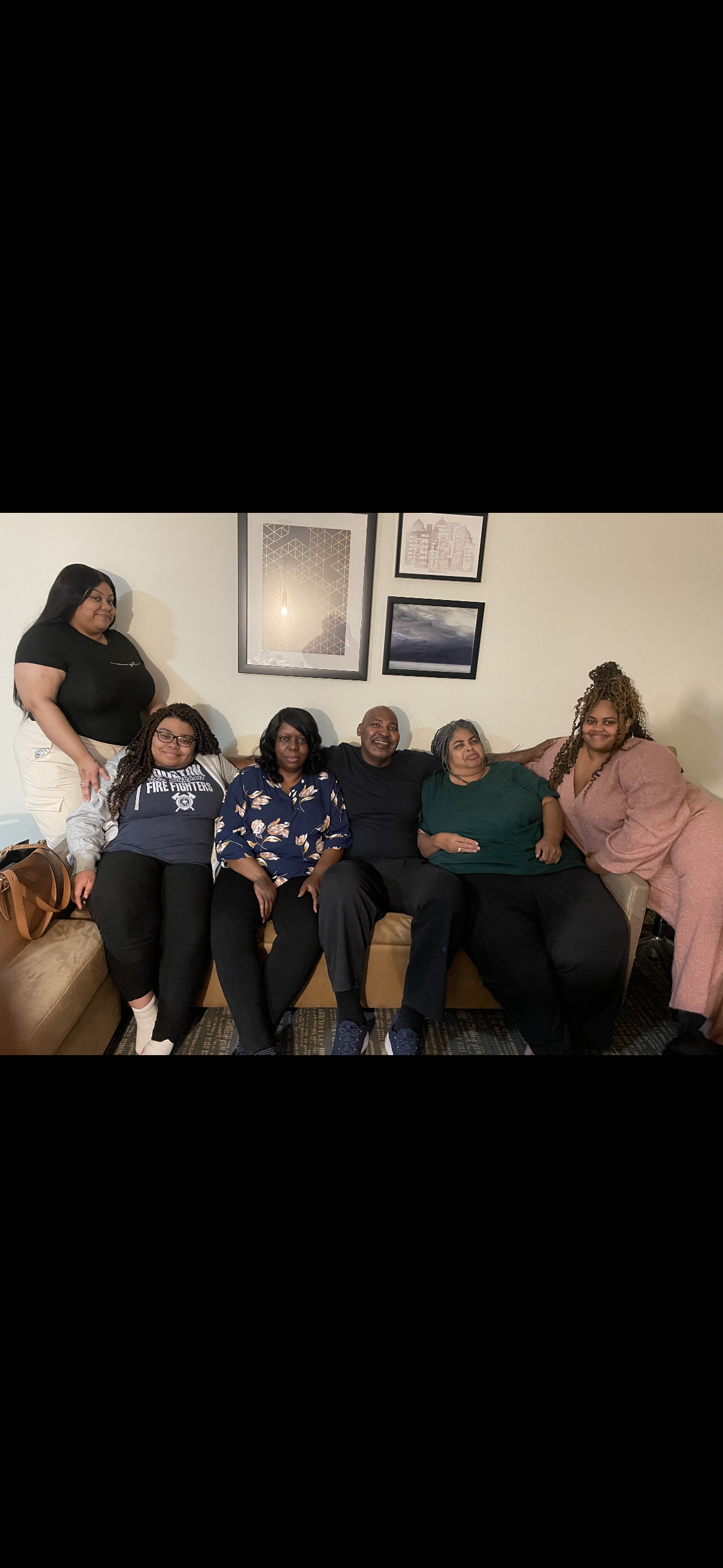 A group of people sitting on a couch