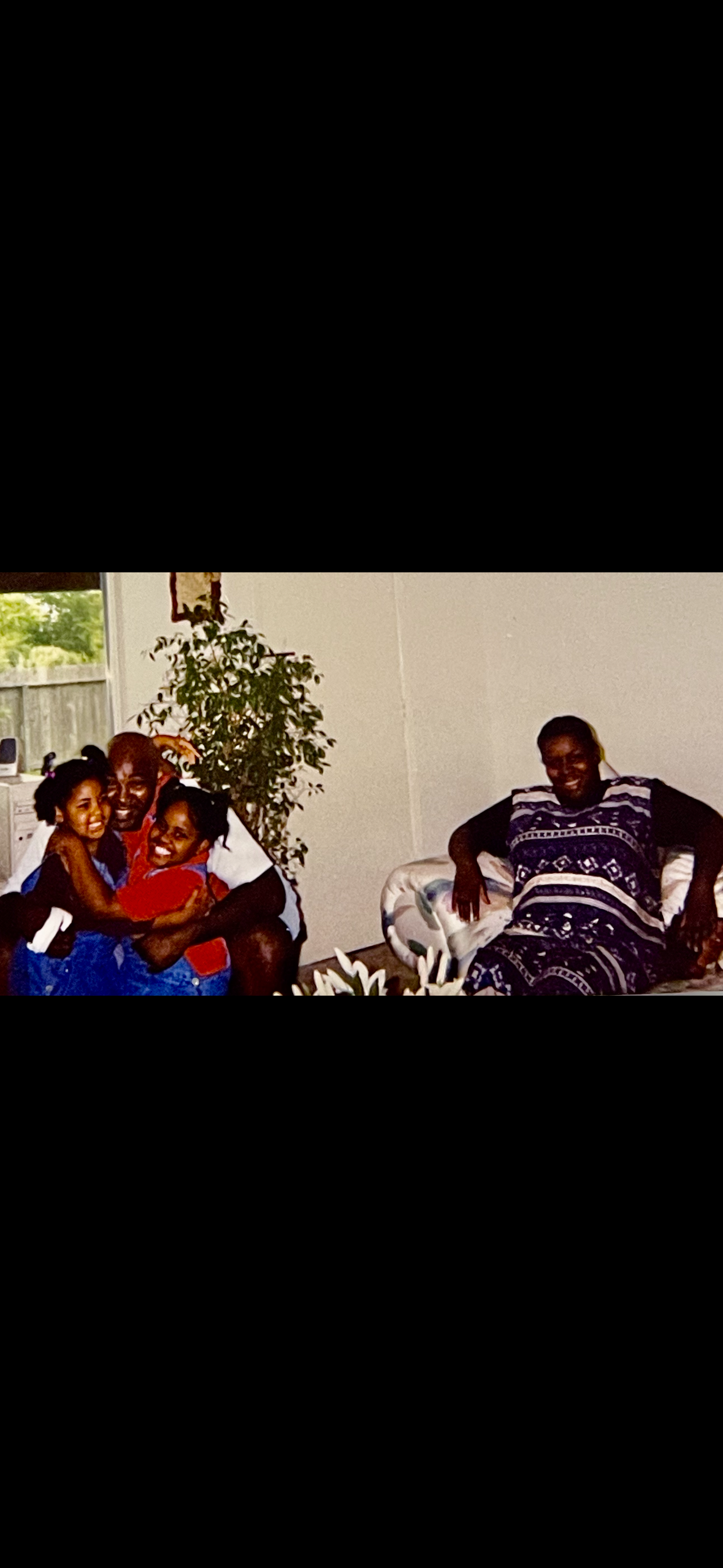 A group of people sitting on a couch
