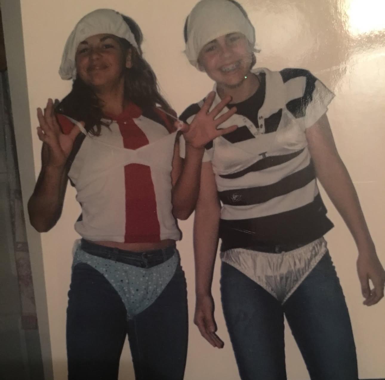 A couple of girls in matching outfits