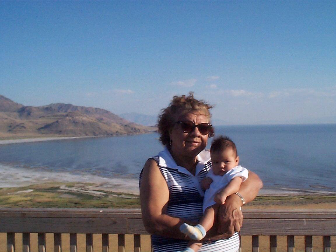A woman holding a baby