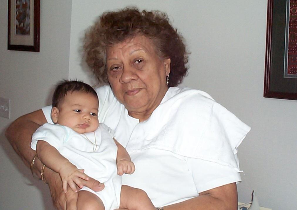 A woman holding a baby