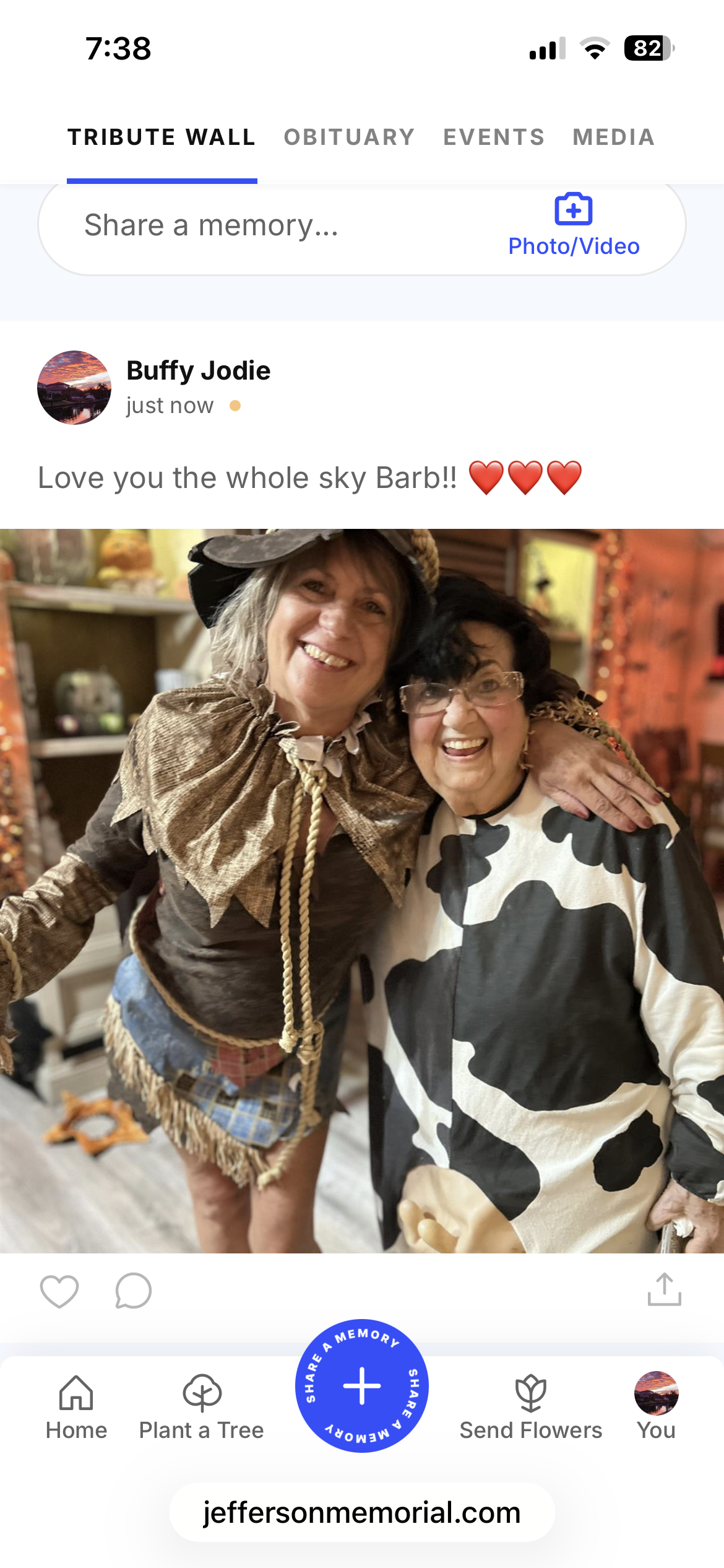 Two women in clothing posing for a photo