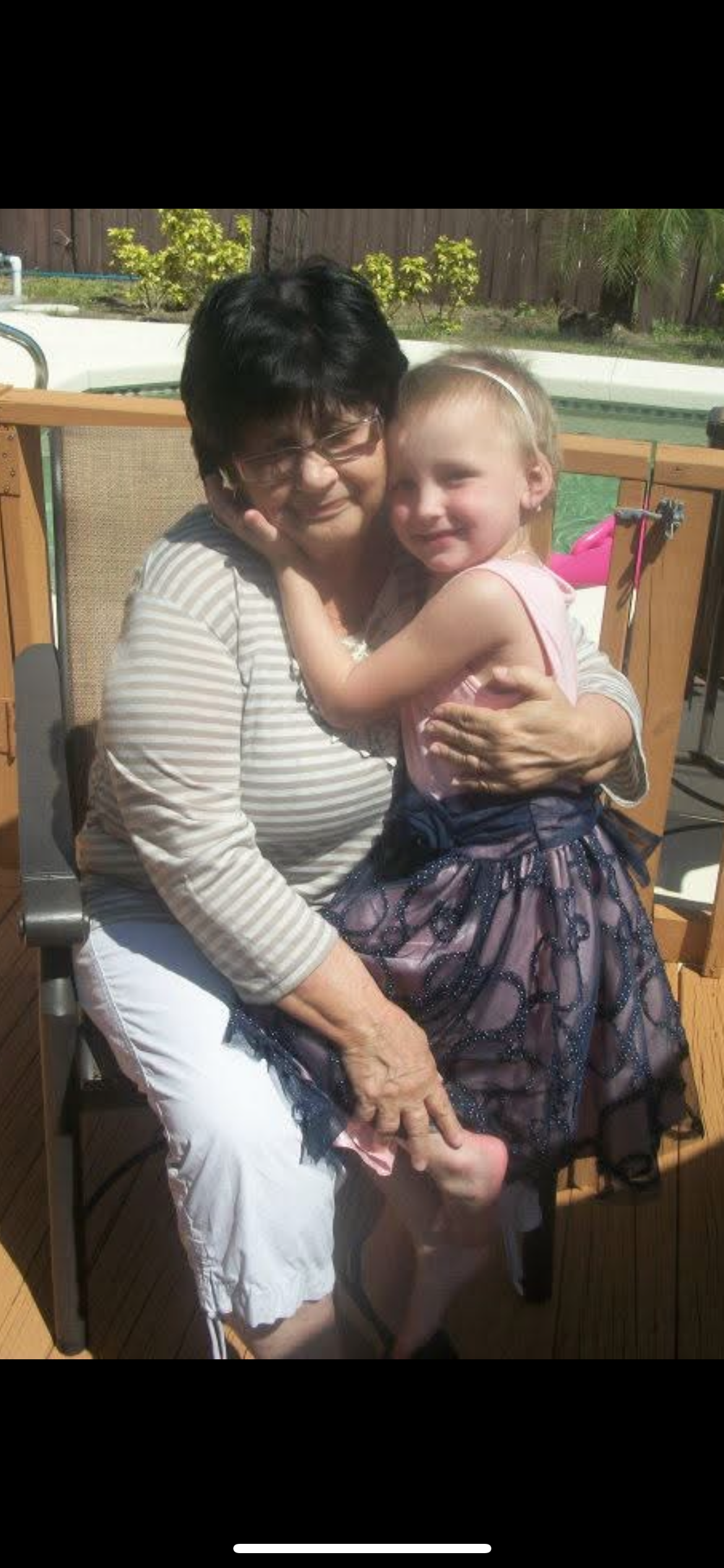 A woman holding a child