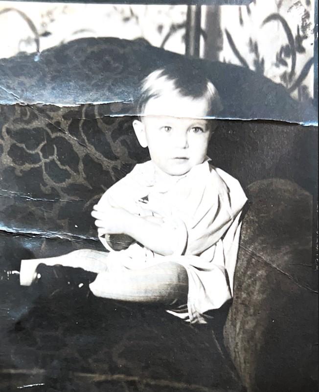A child sitting on a couch
