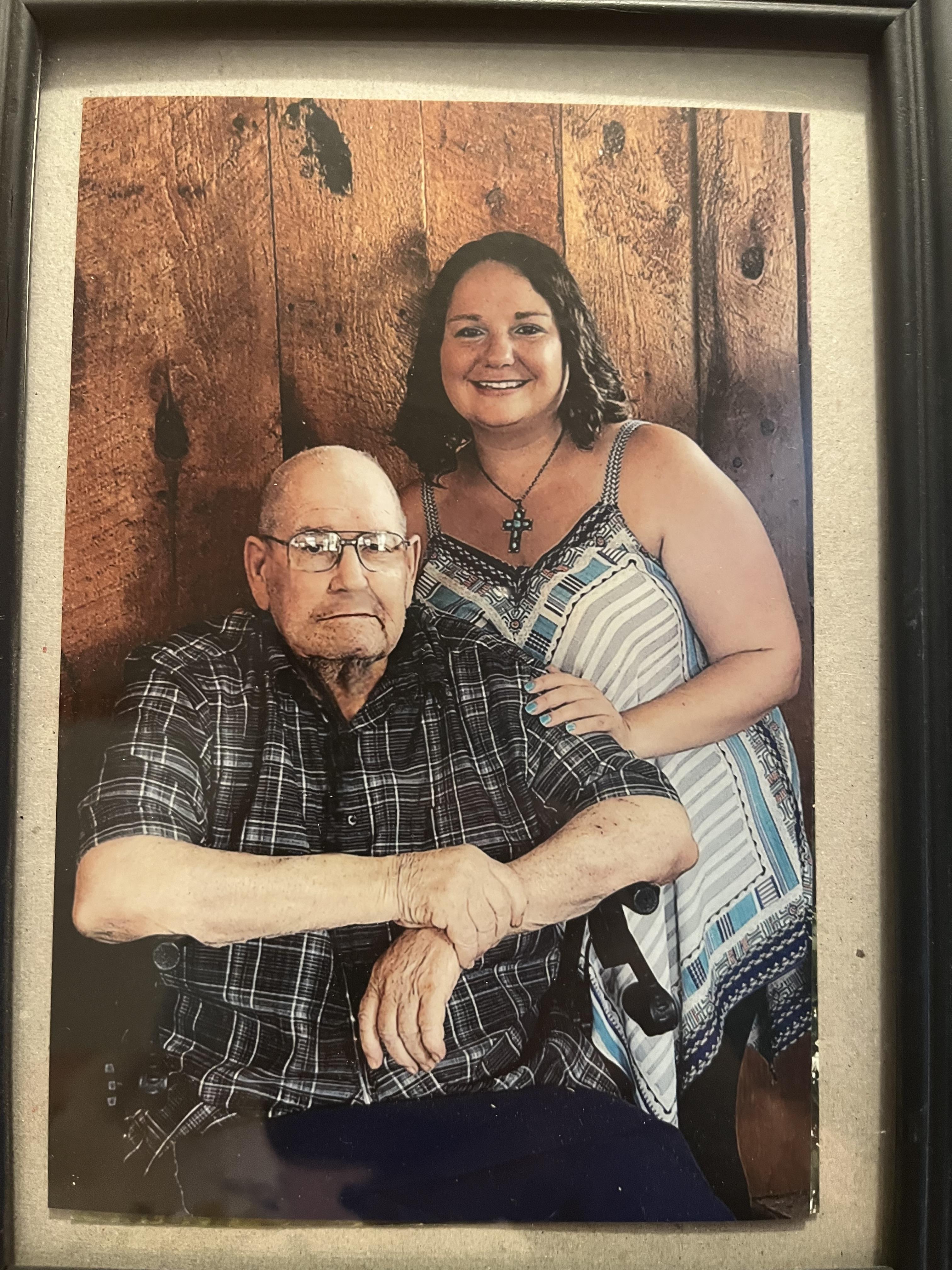 A man and woman posing for a picture