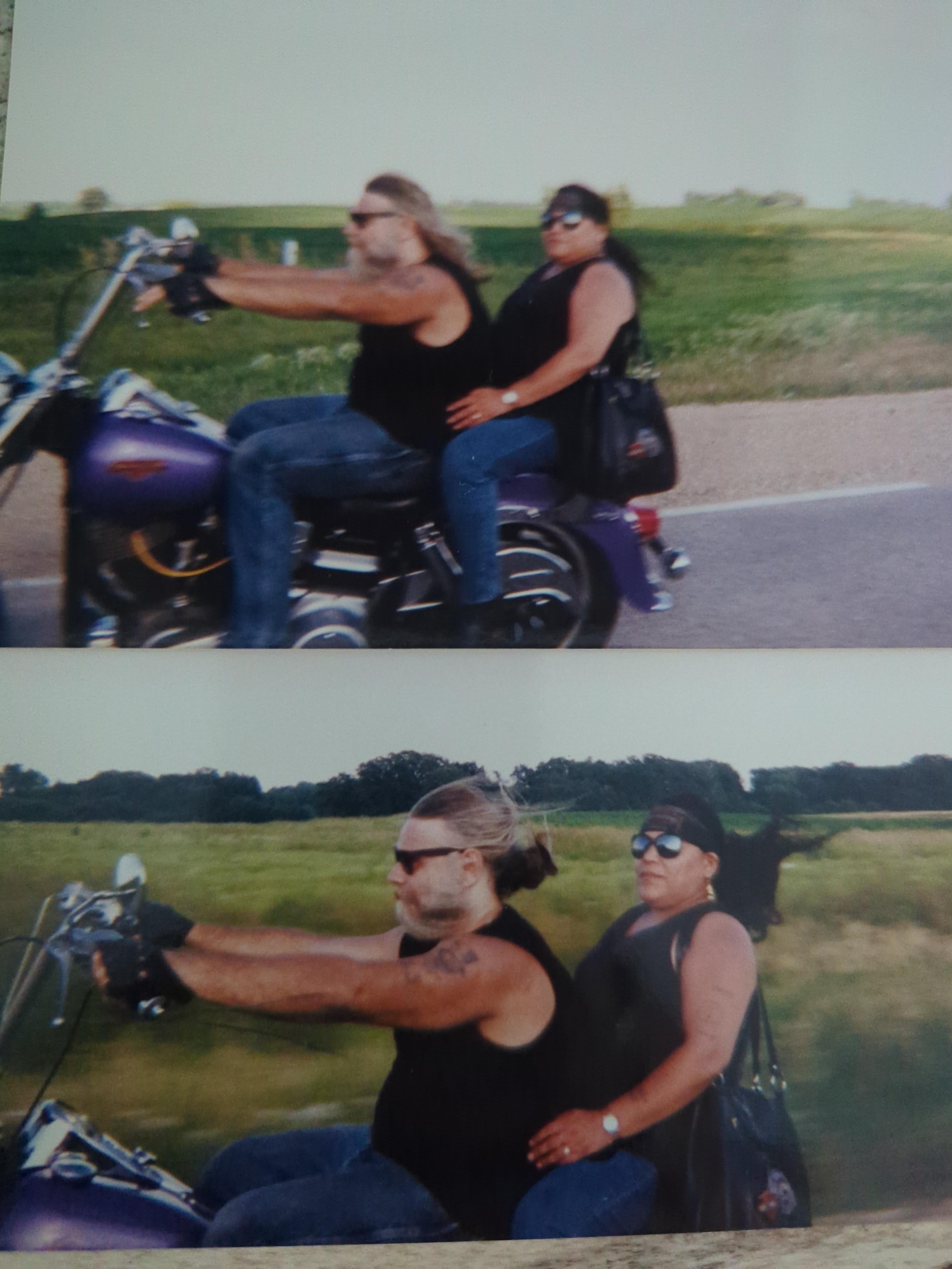 A couple of people on a motorcycle