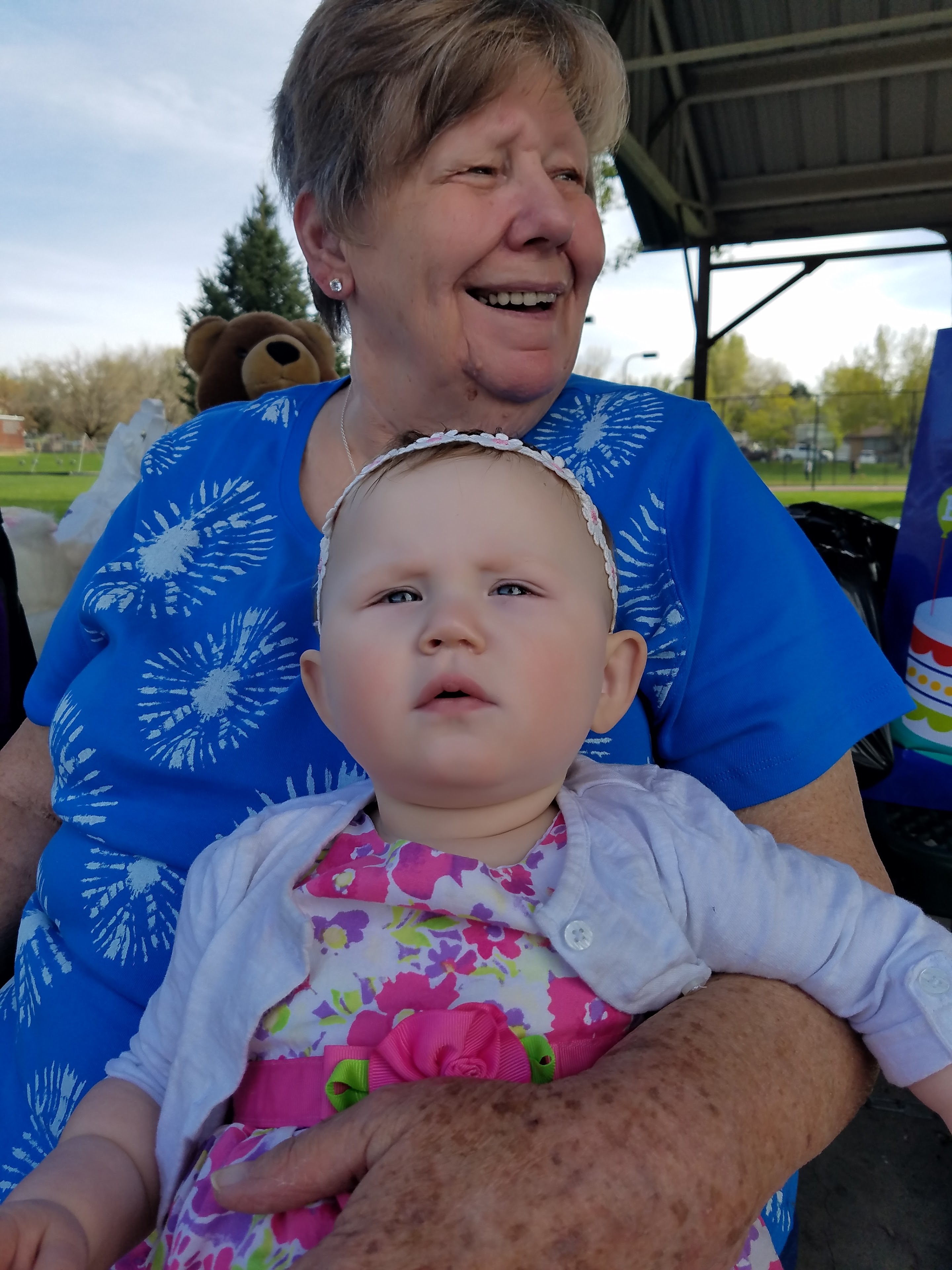 A woman holding a baby