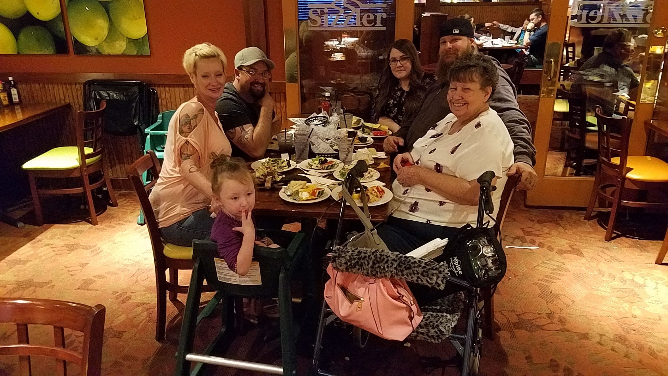 A group of people sitting at a table