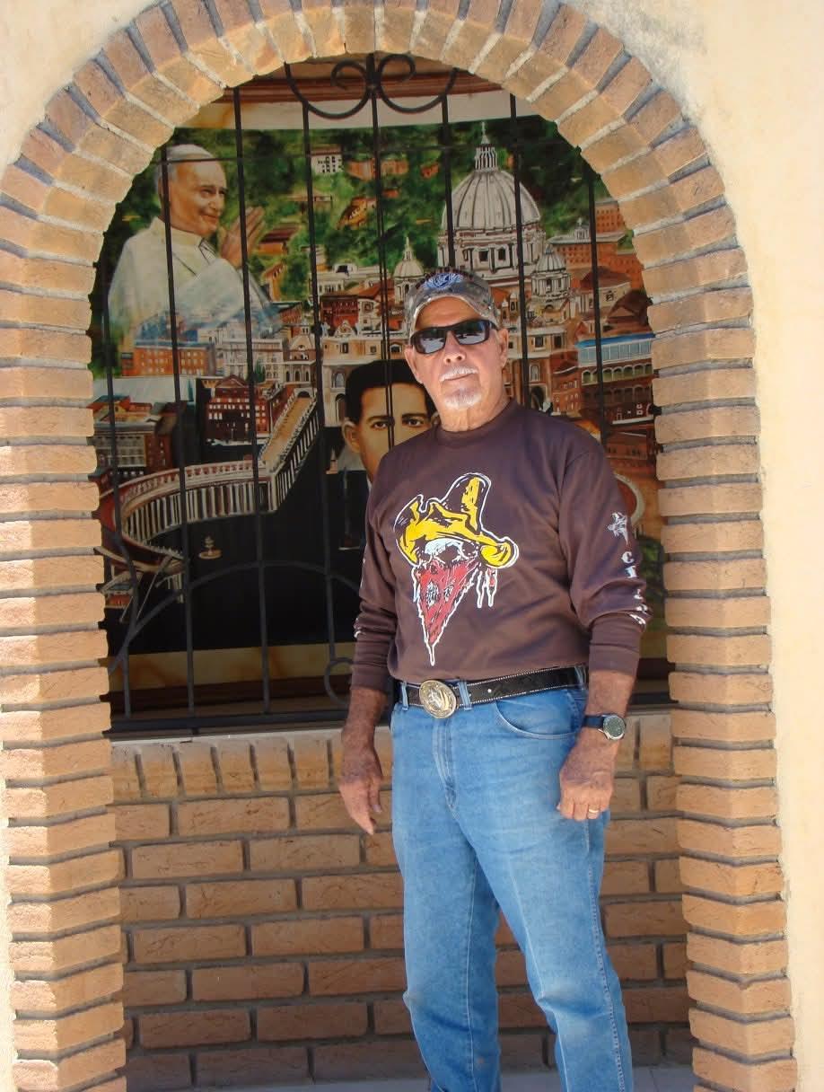 A man standing in front of a window