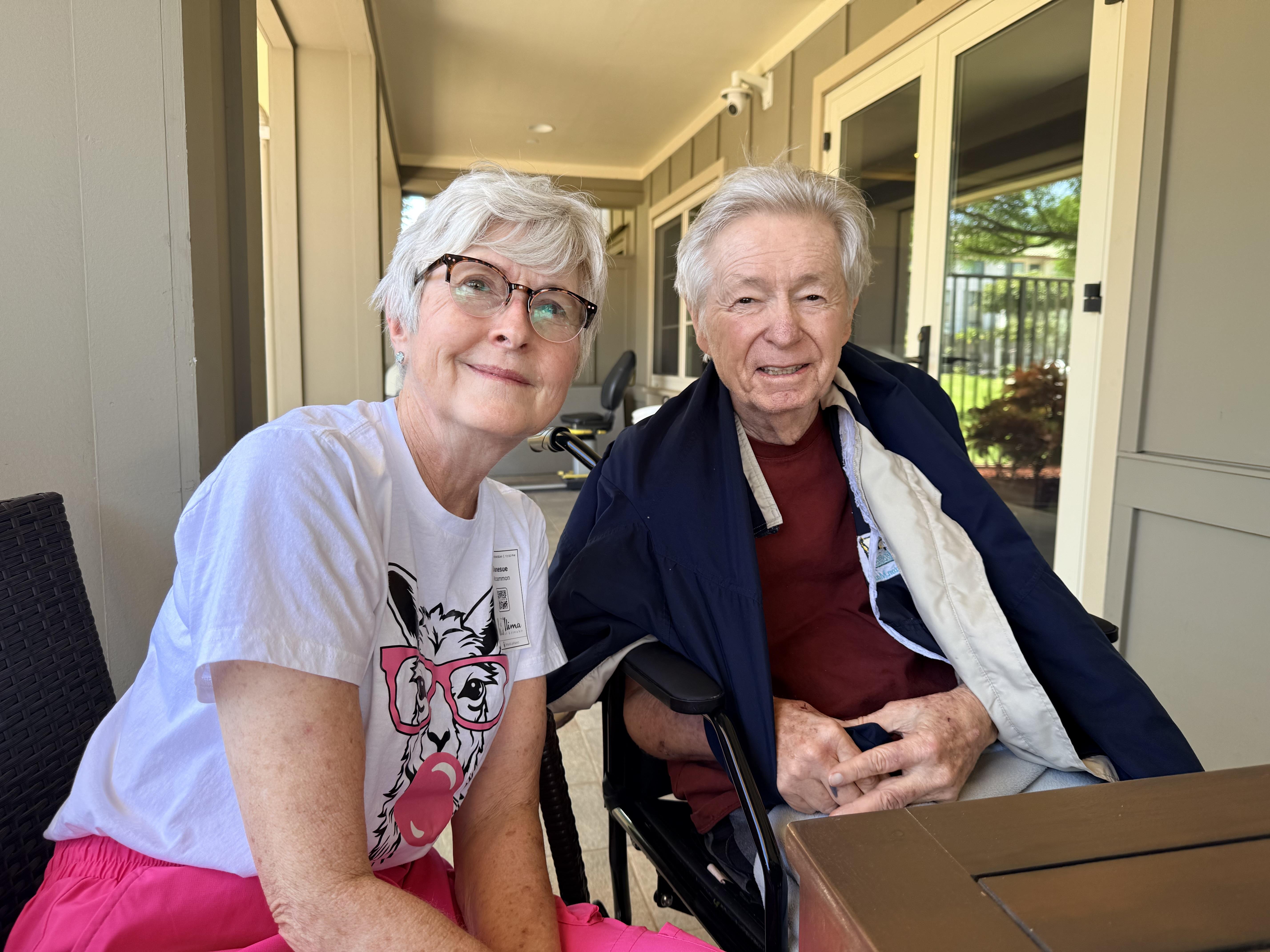 Two people sitting at a table