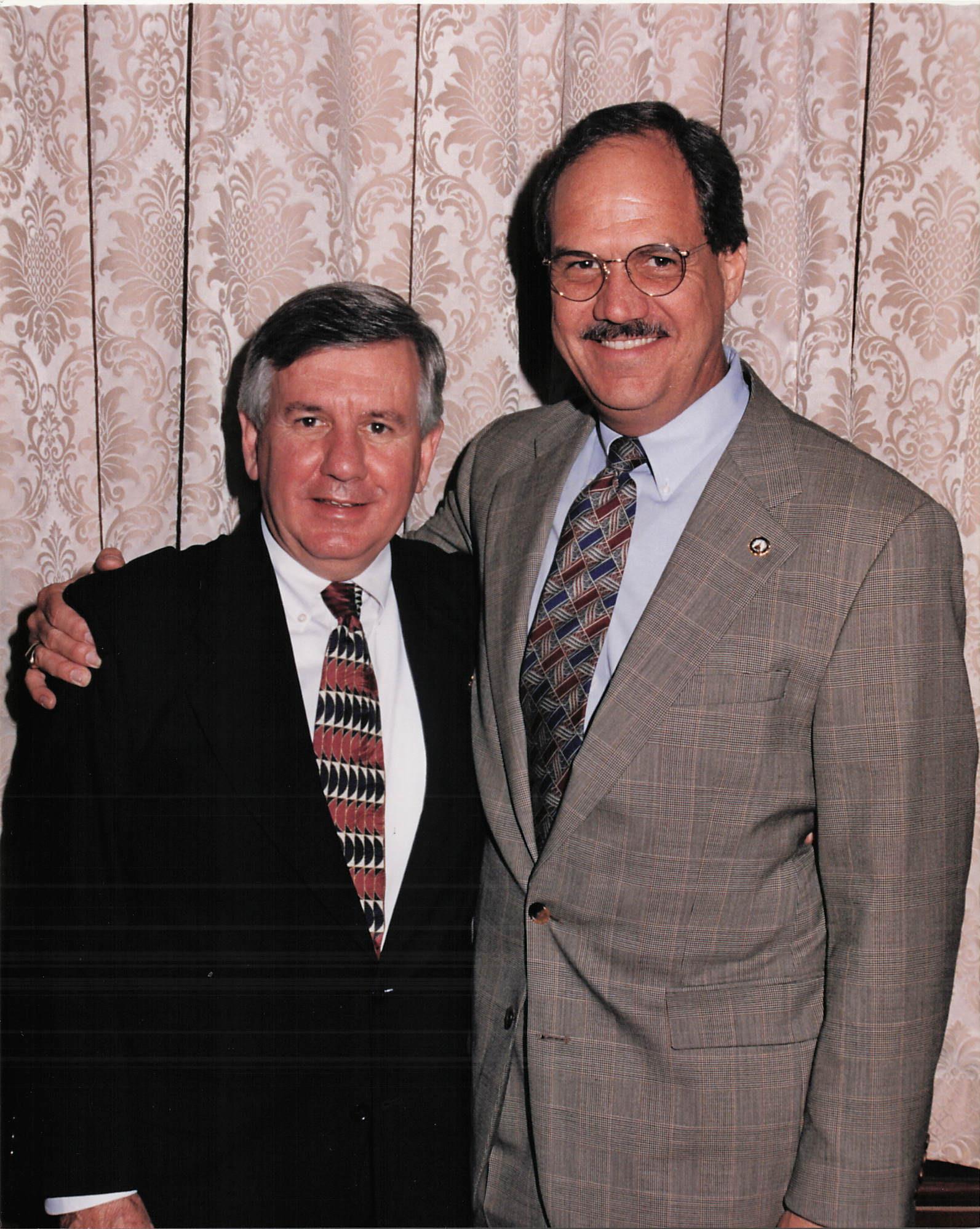 A couple of men in suits