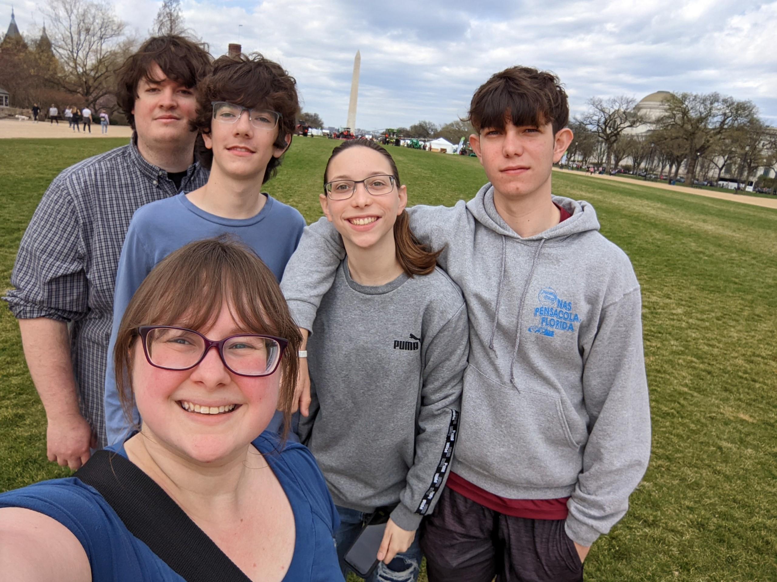 A group of people posing for a selfie