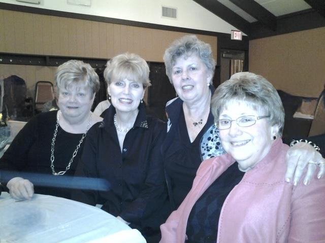A group of women posing for a photo