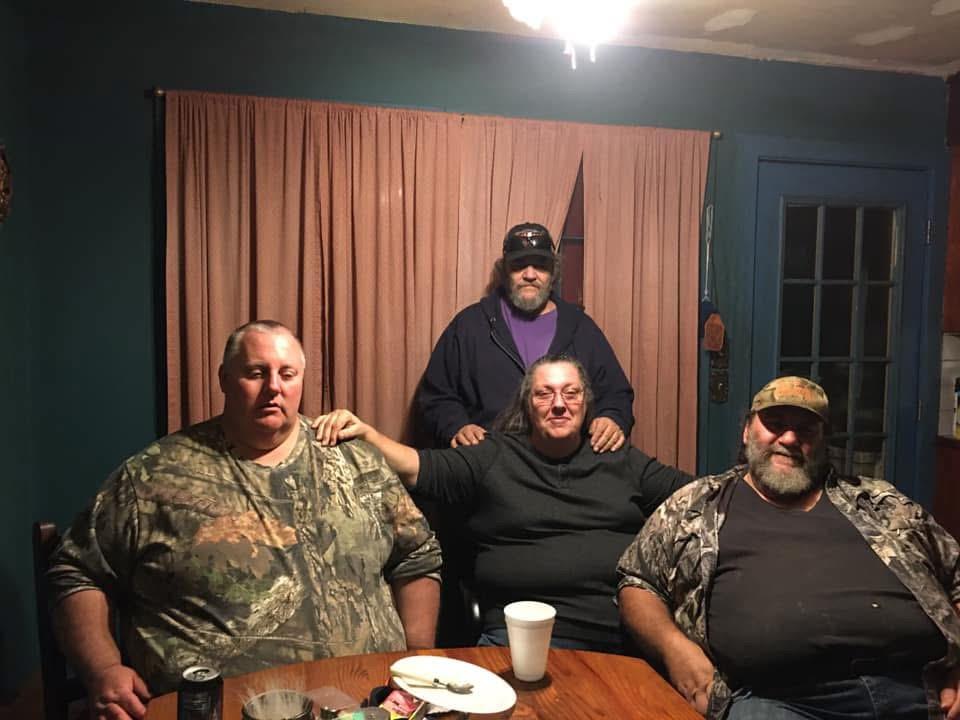 A group of people sitting at a table