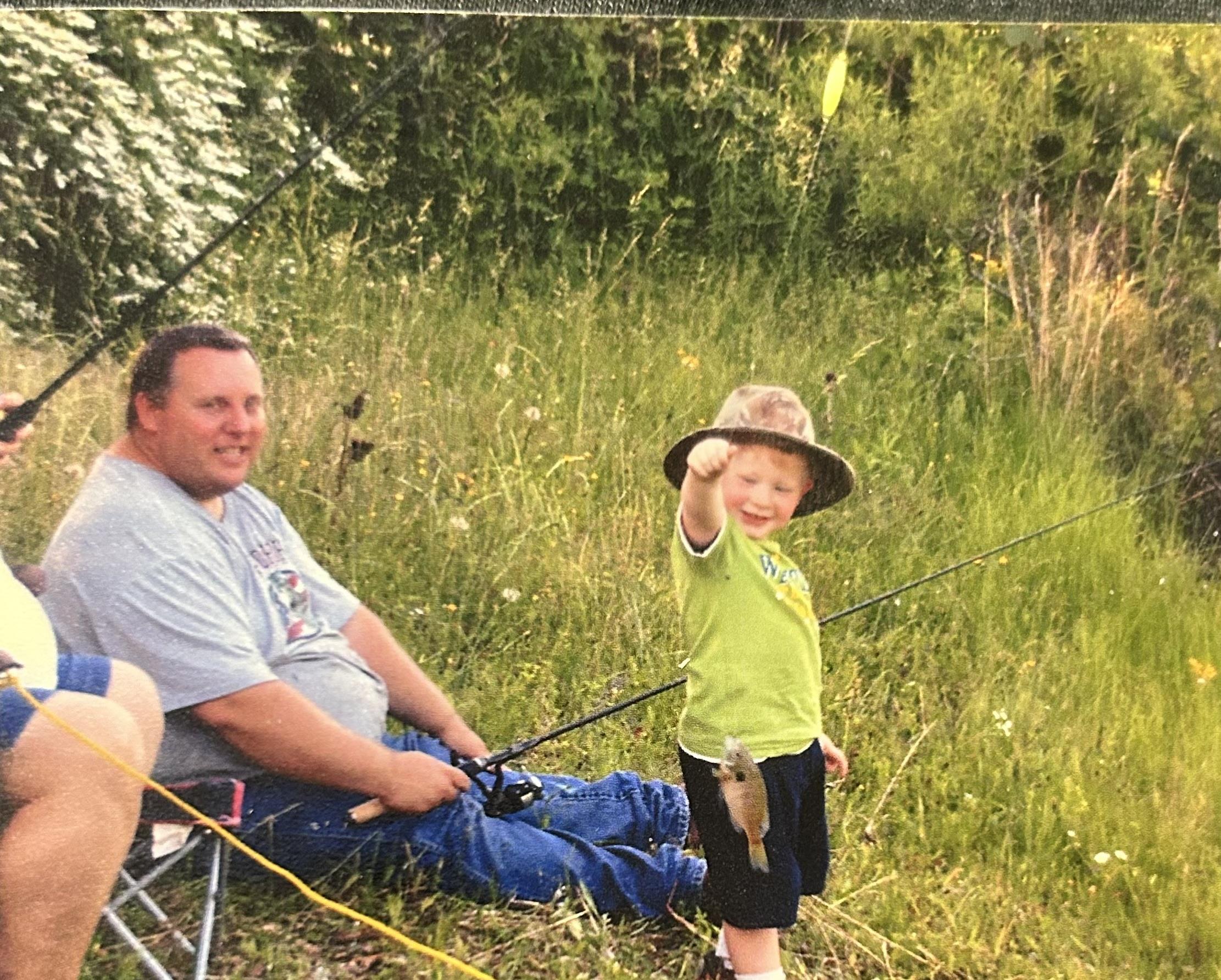 A man and a child fishing