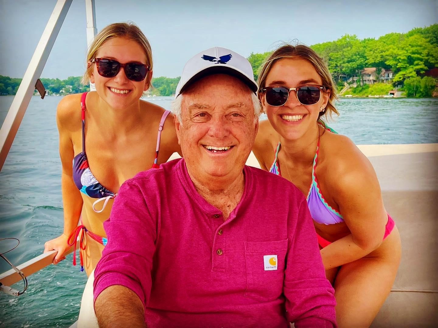 A man and two women on a boat