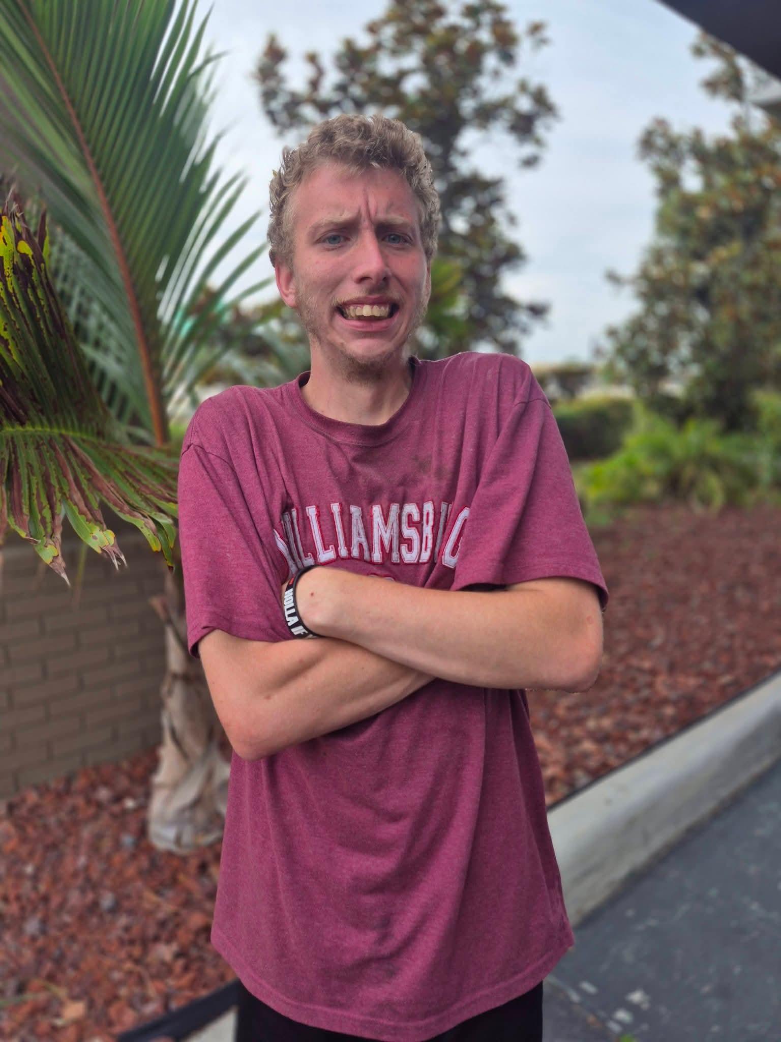 A man with his arms crossed
