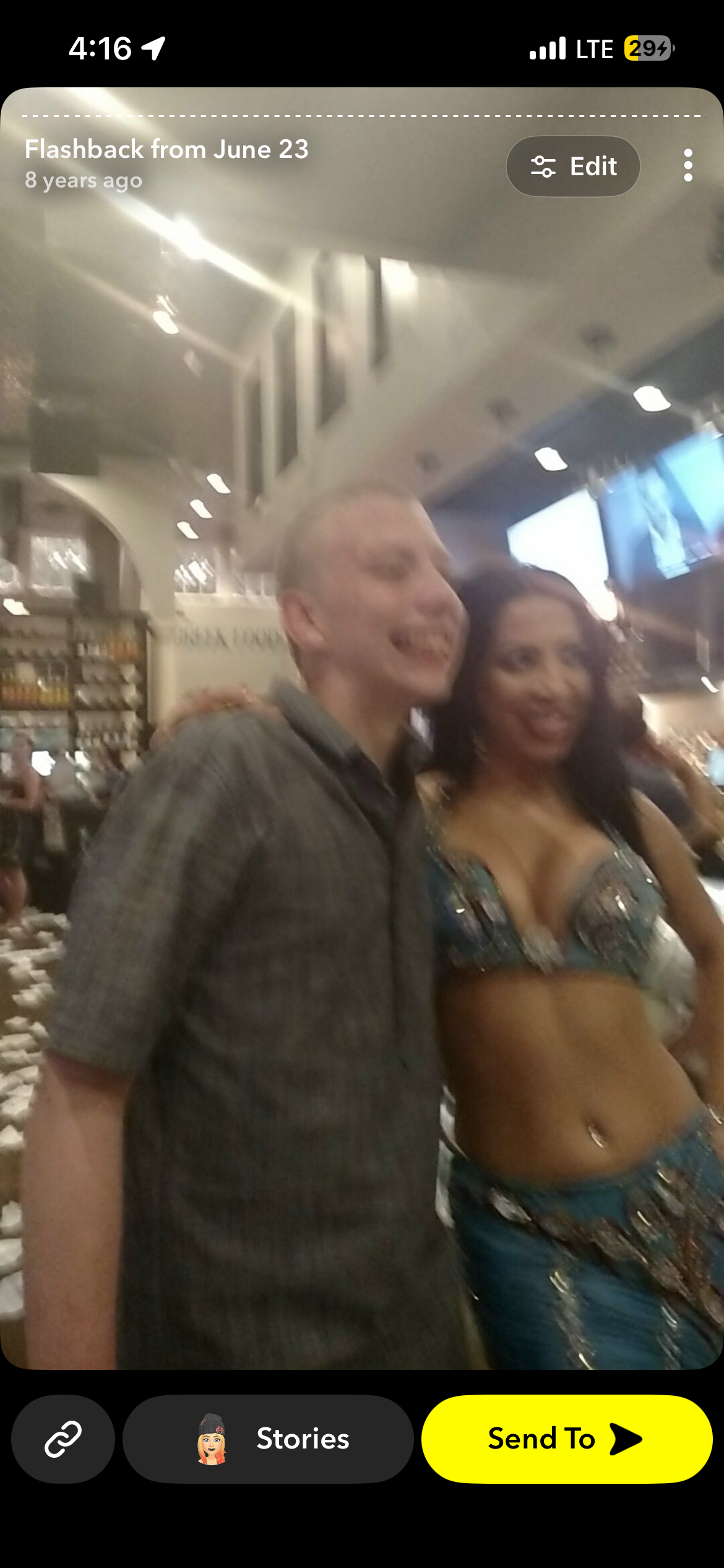 A man and woman posing for a picture