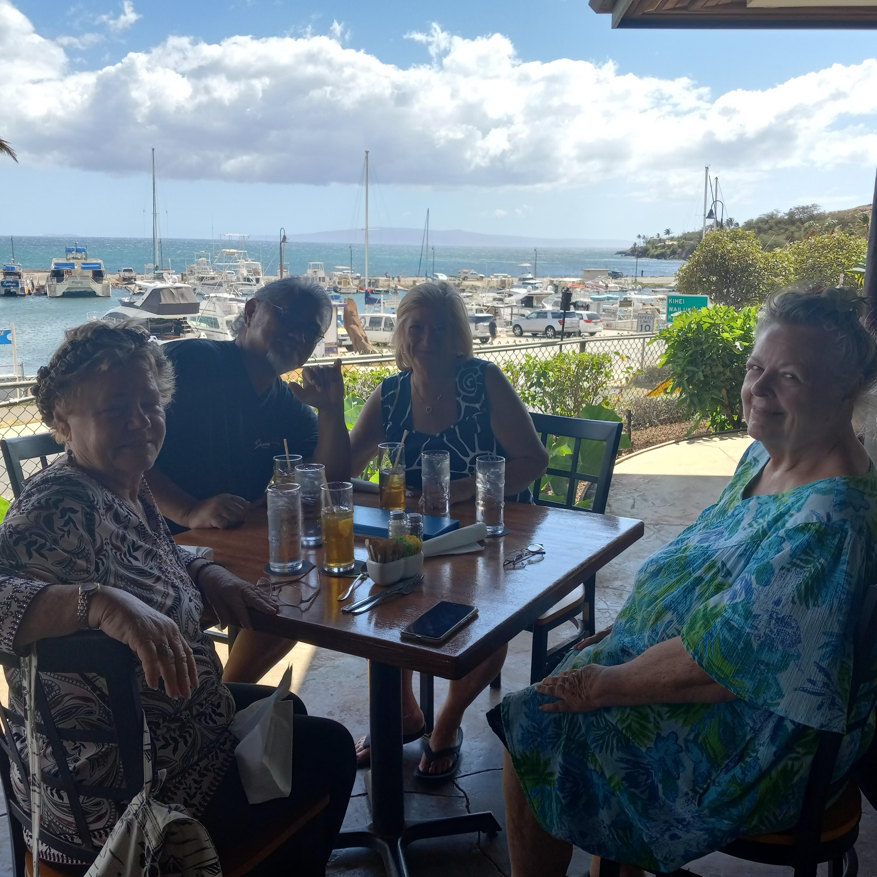 A group of women sitting at a table