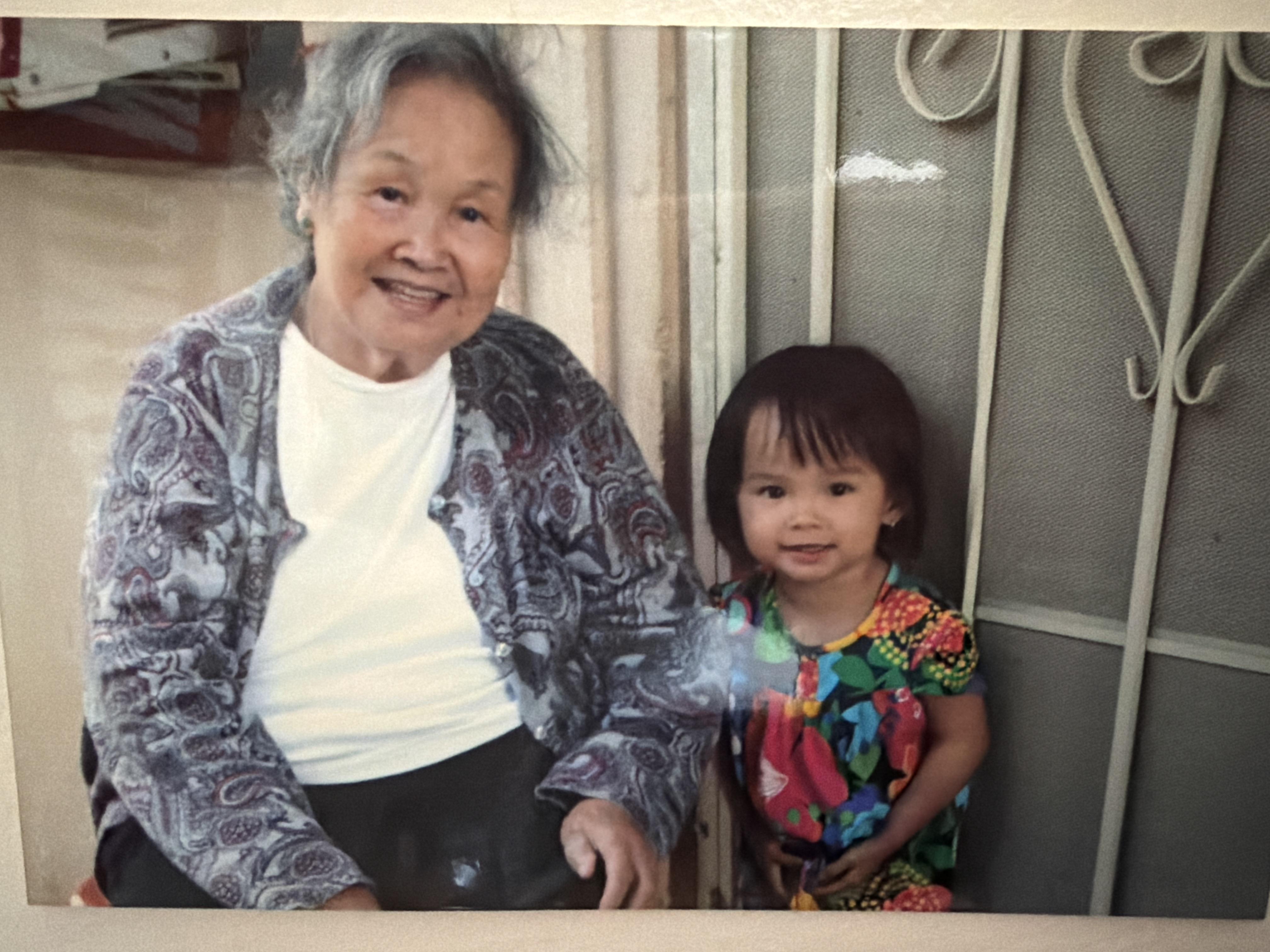 An old woman and a young girl