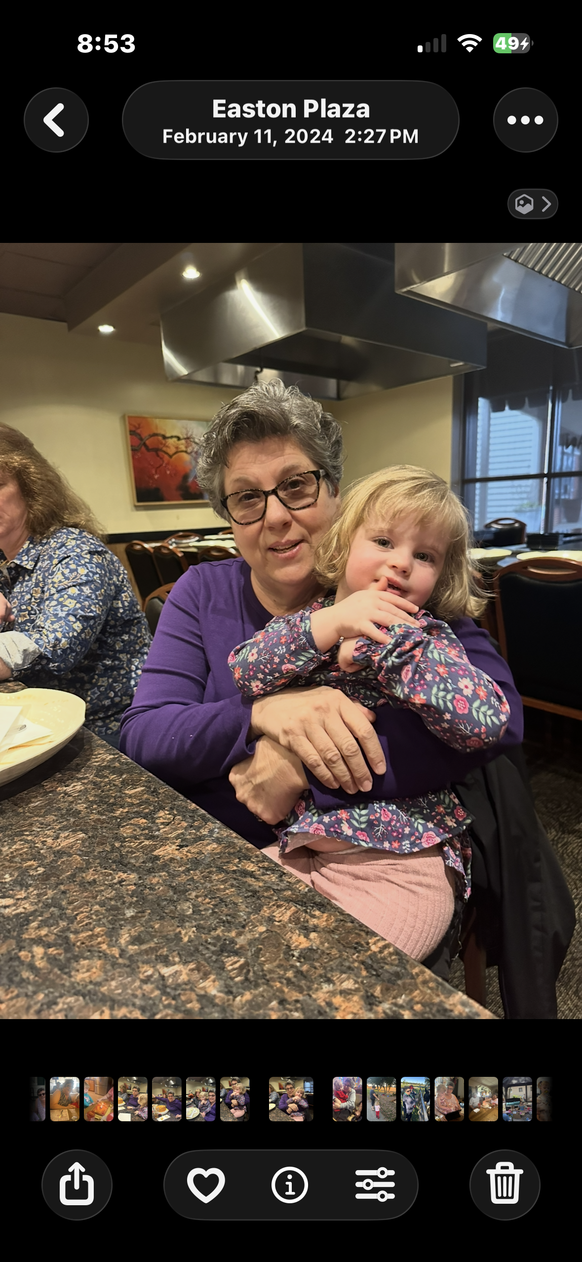 A woman holding a child
