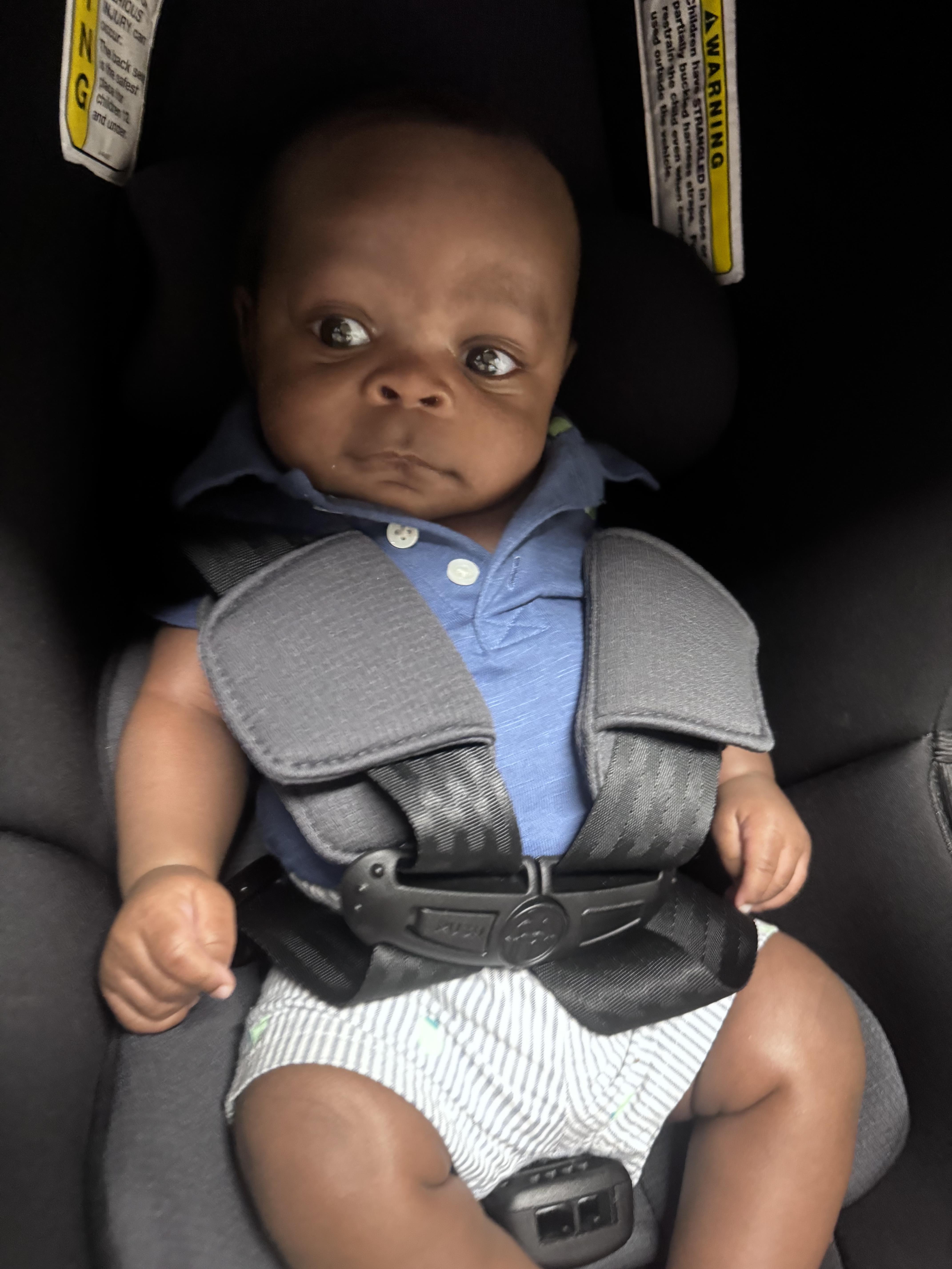 A baby in a car seat