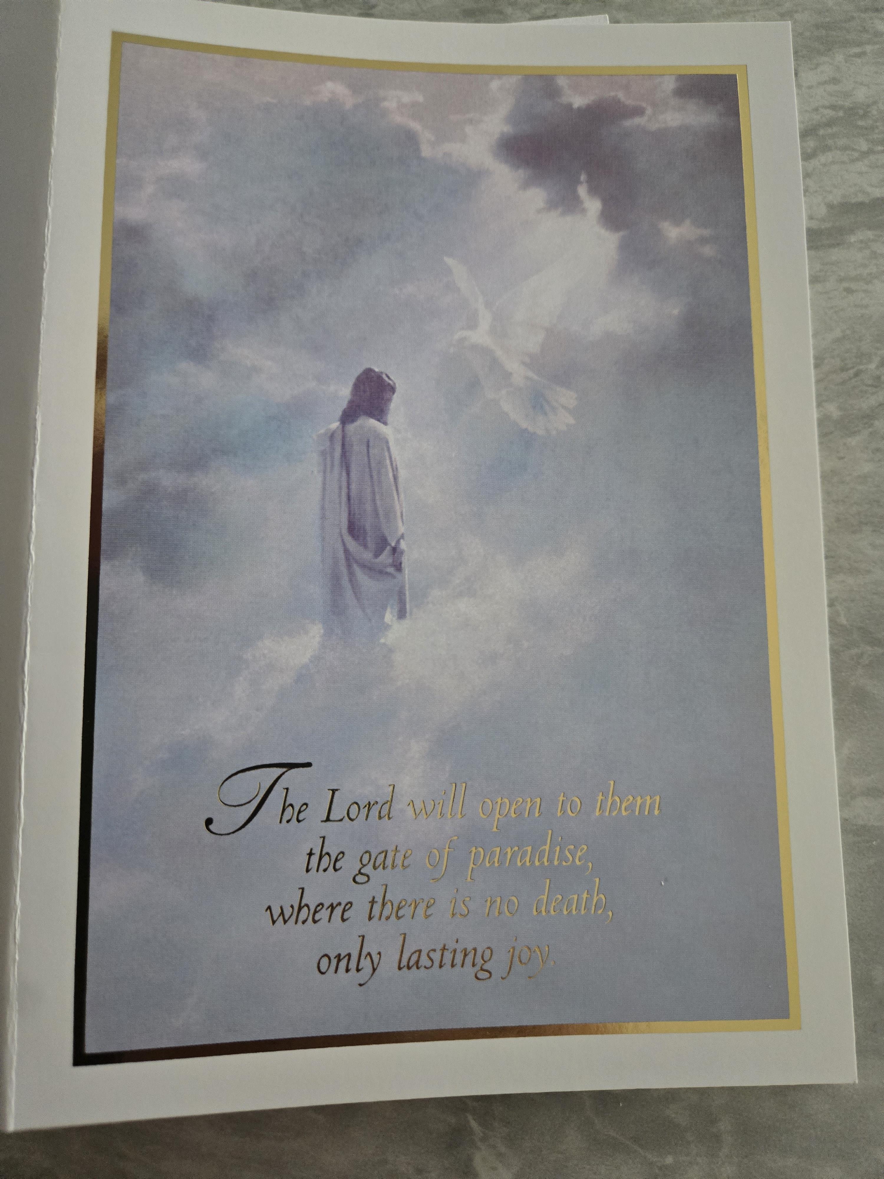 A card with a man in the clouds