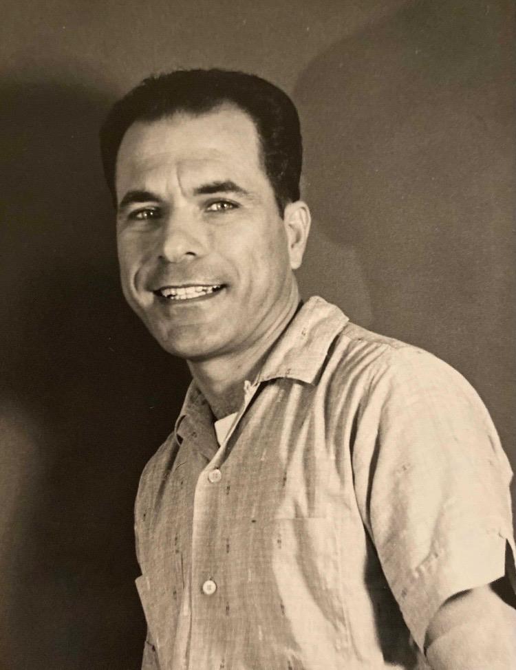 A man smiling for a picture