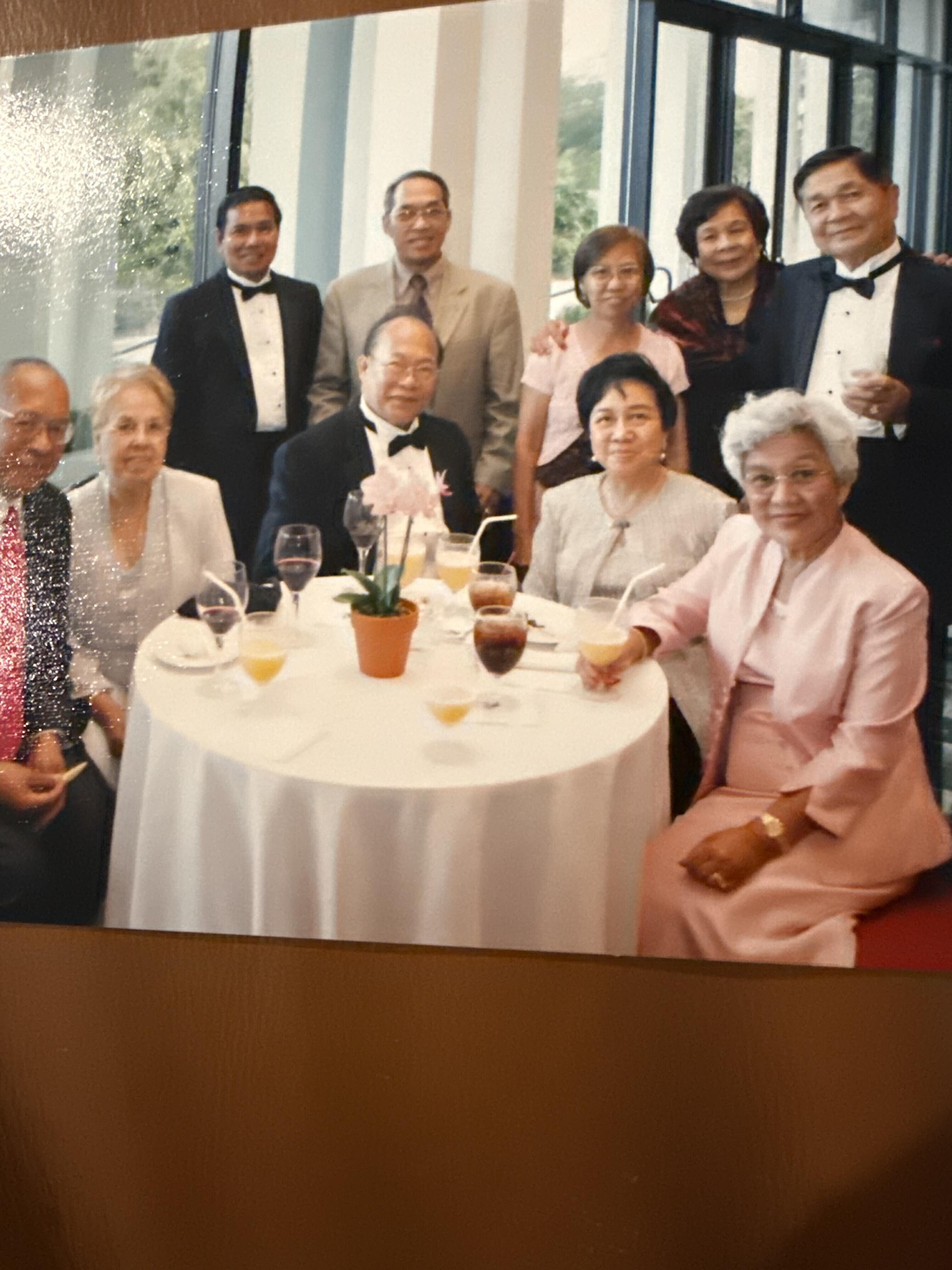 A group of people sitting at a table