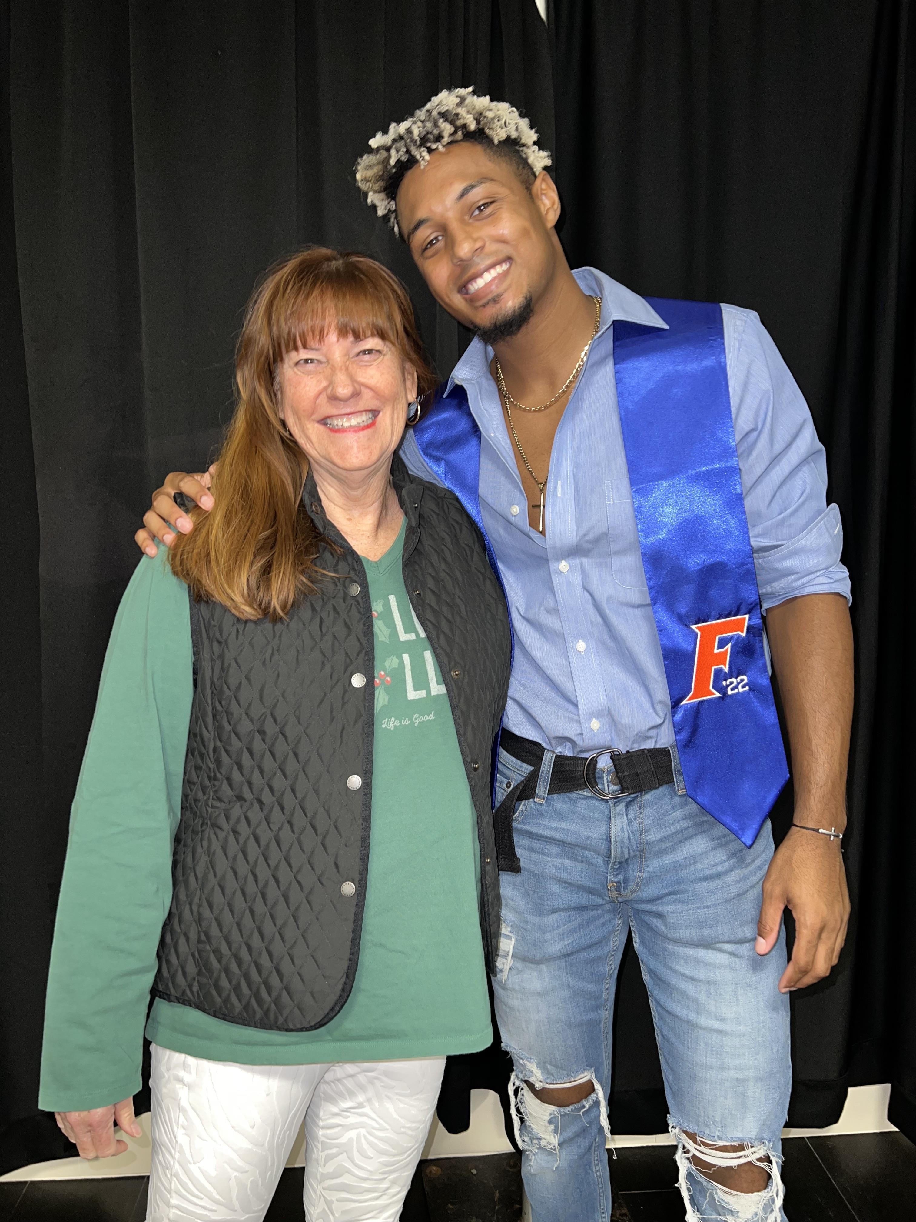 A man and woman posing for a picture