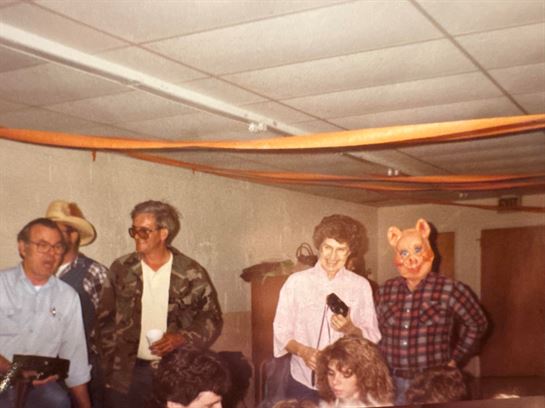 A group of people wearing clothing