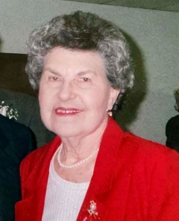 A woman in a red jacket