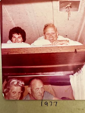 A group of people in a bunk bed