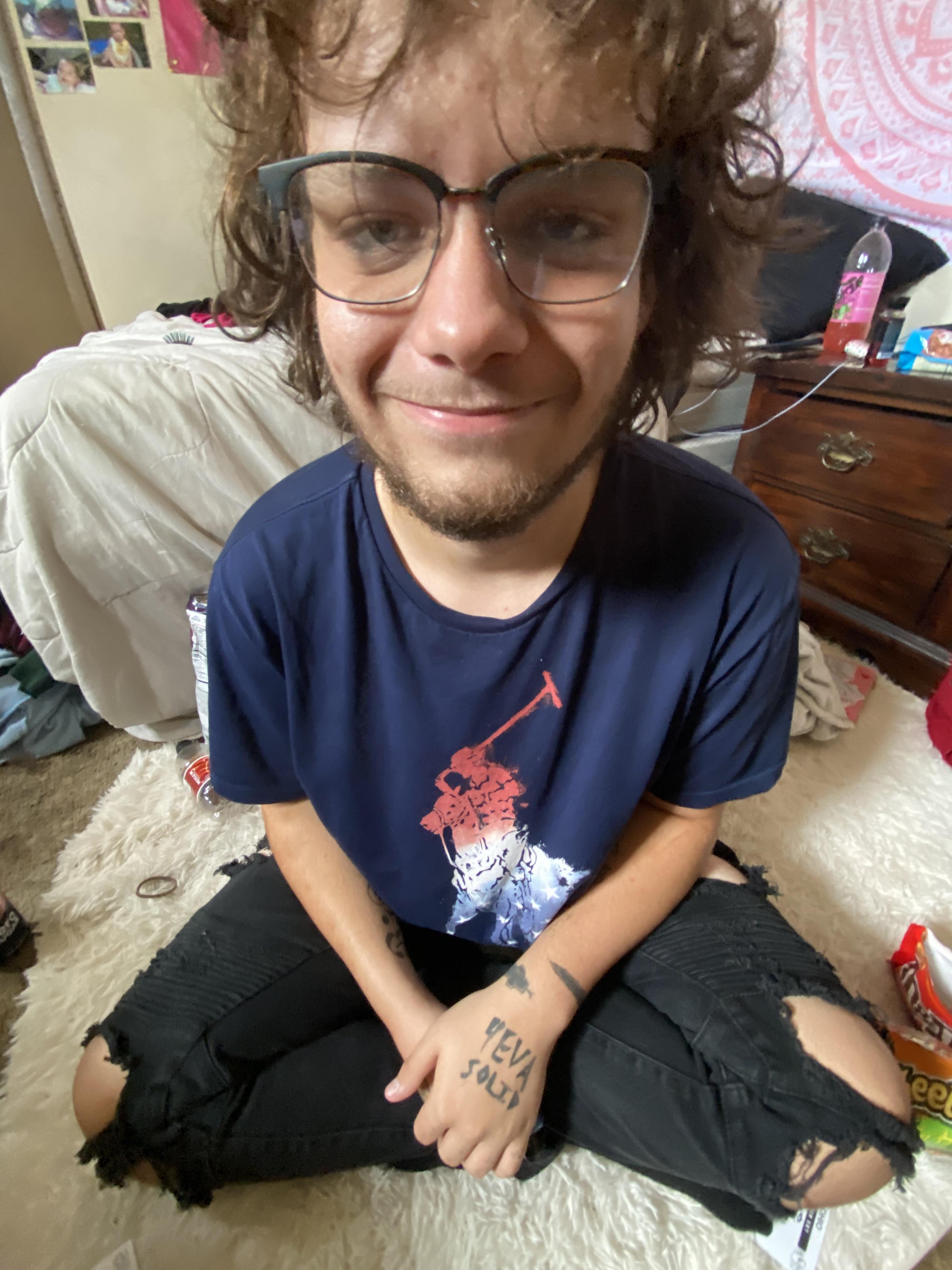 A man sitting on the floor