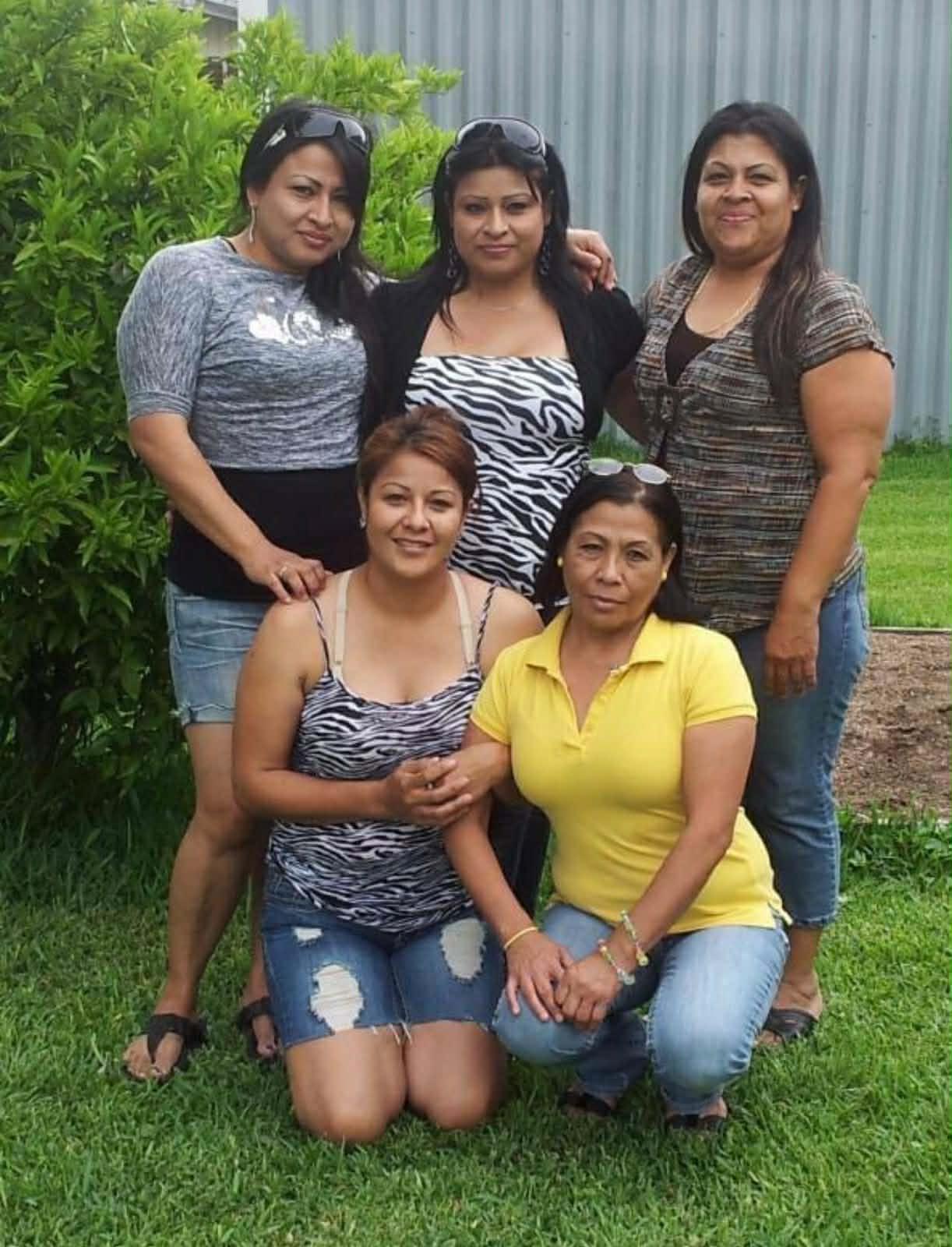 A group of women posing for a photo