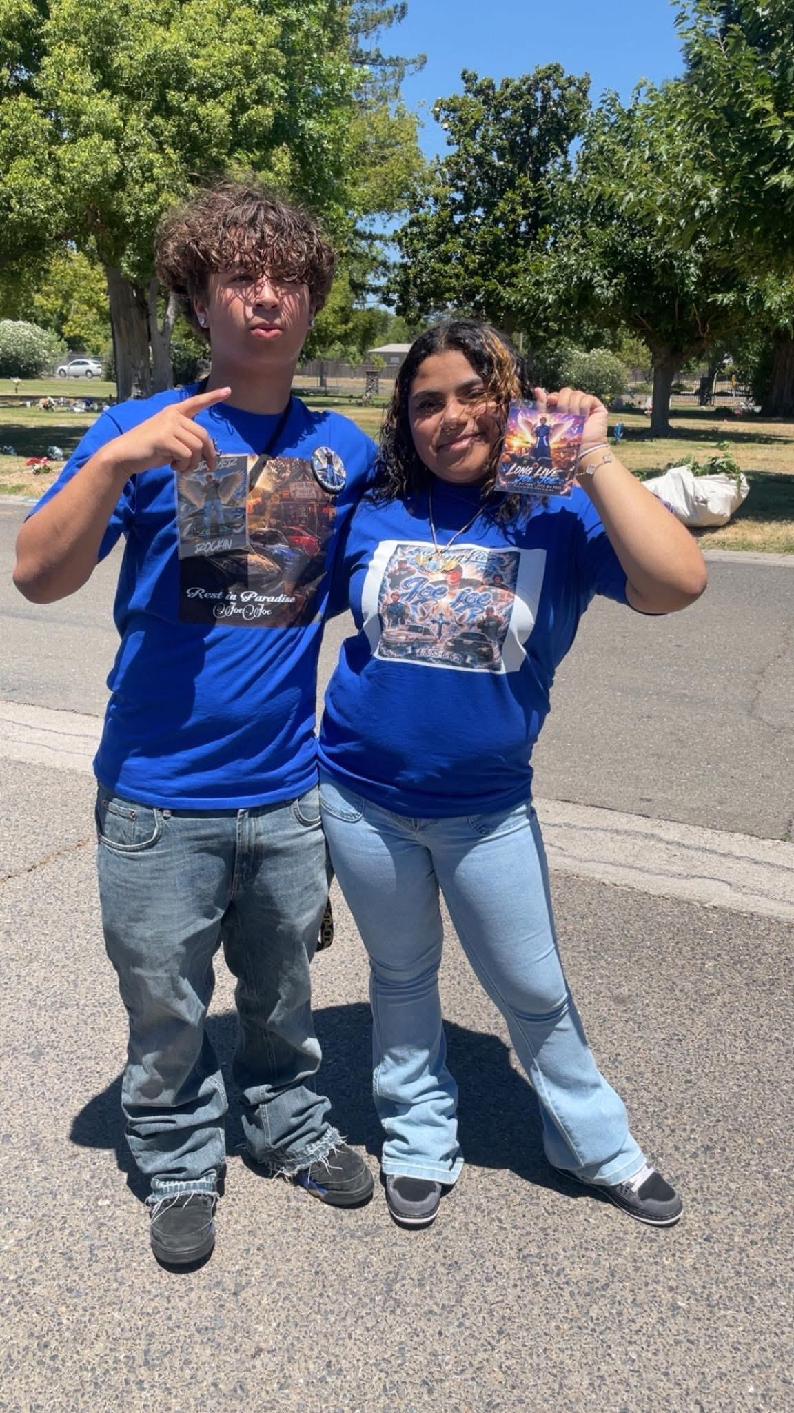 A man and woman posing for a picture