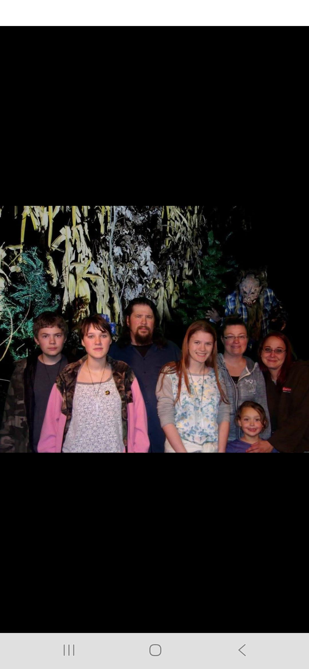 A group of people posing for a photo