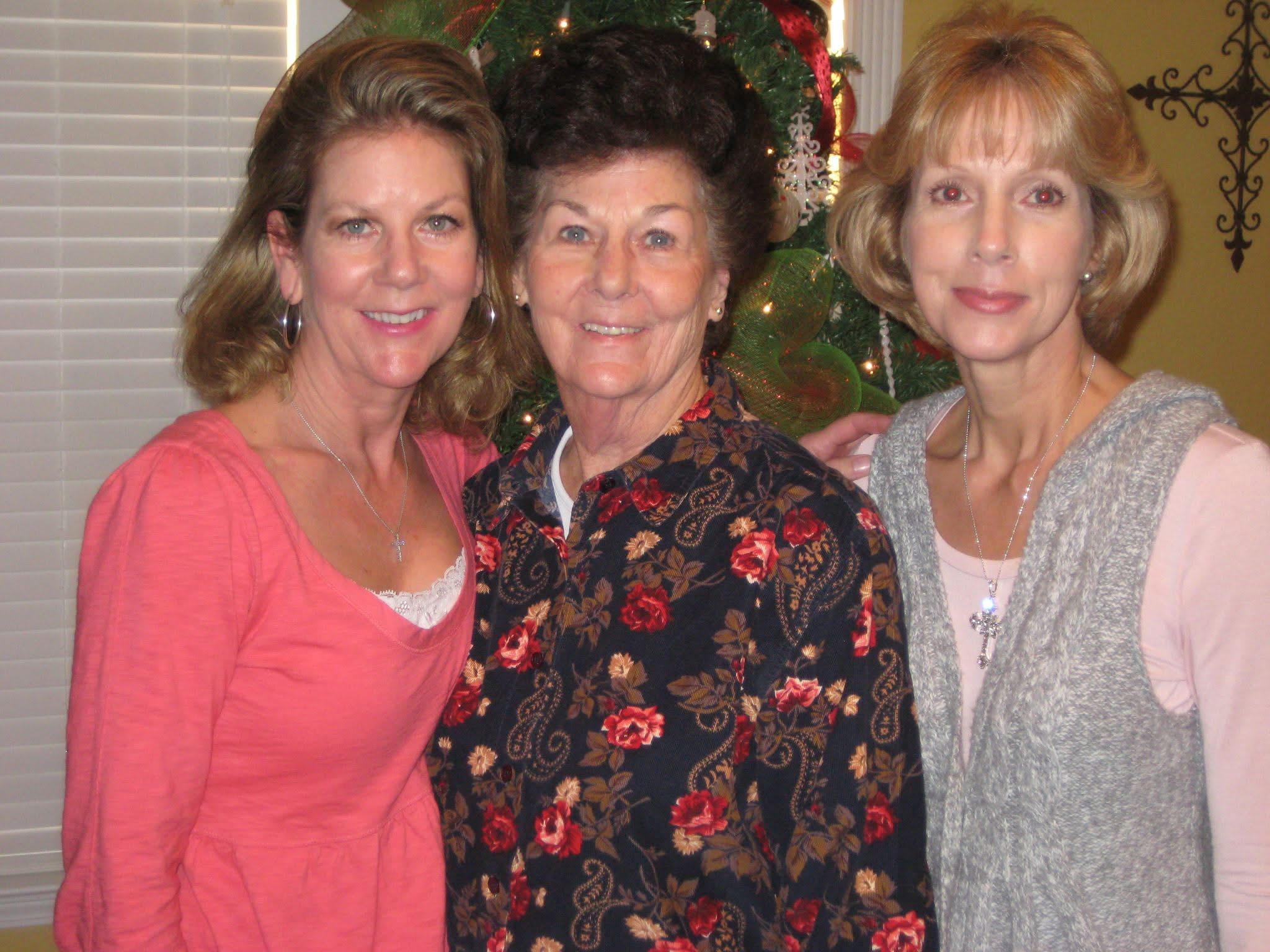 A group of women posing for a photo