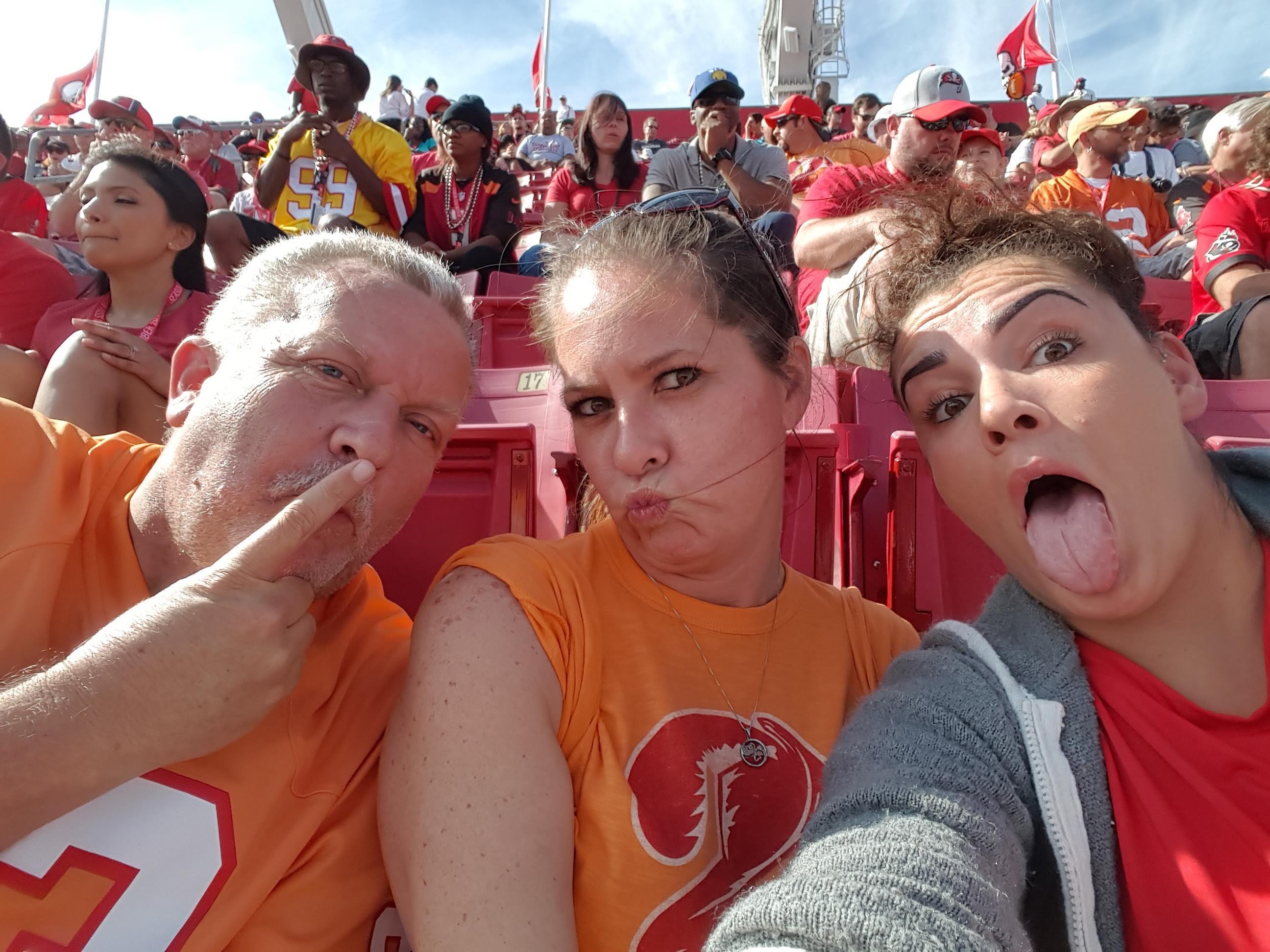 A group of people taking a selfie