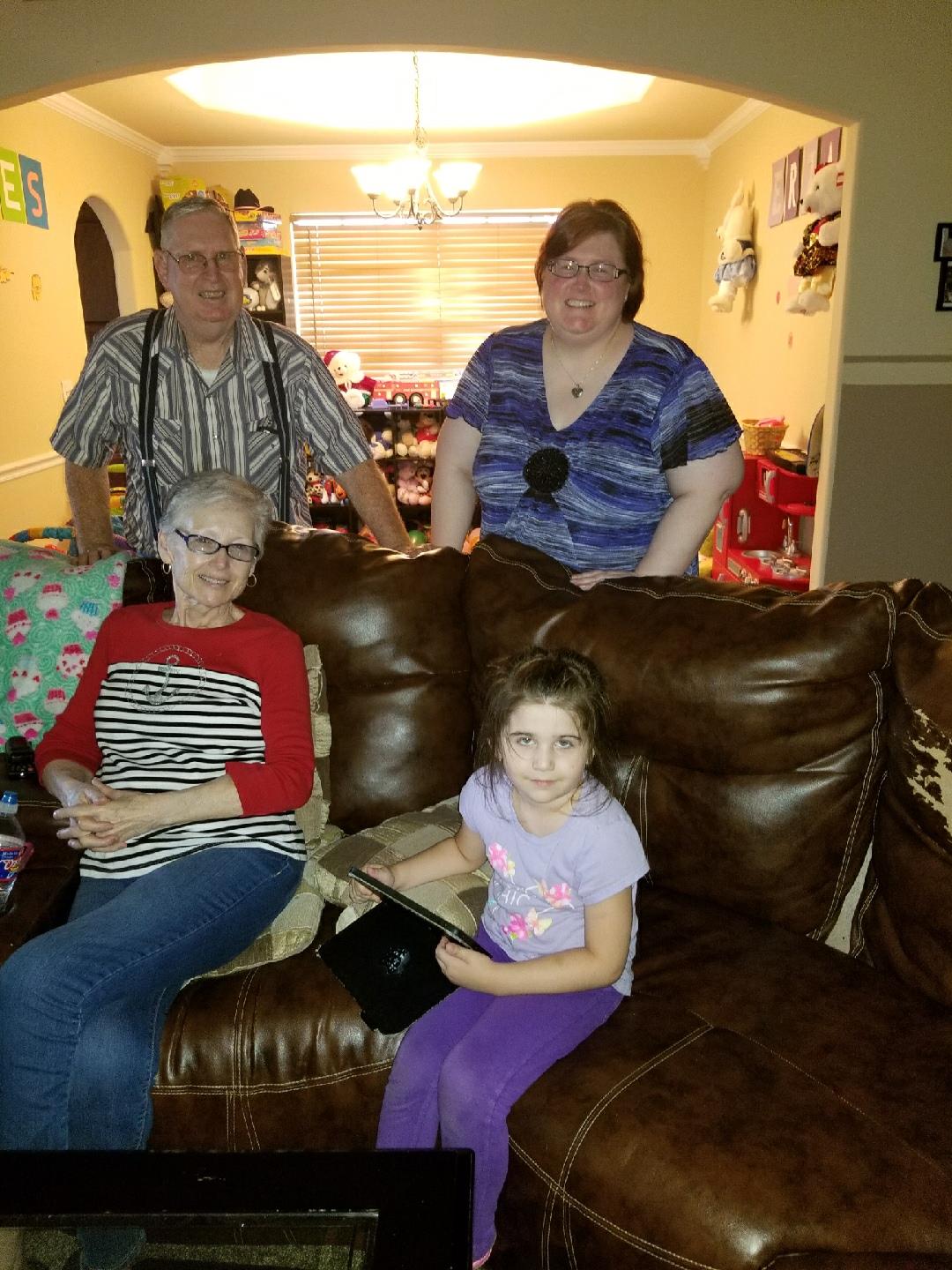 A group of people sitting on a couch