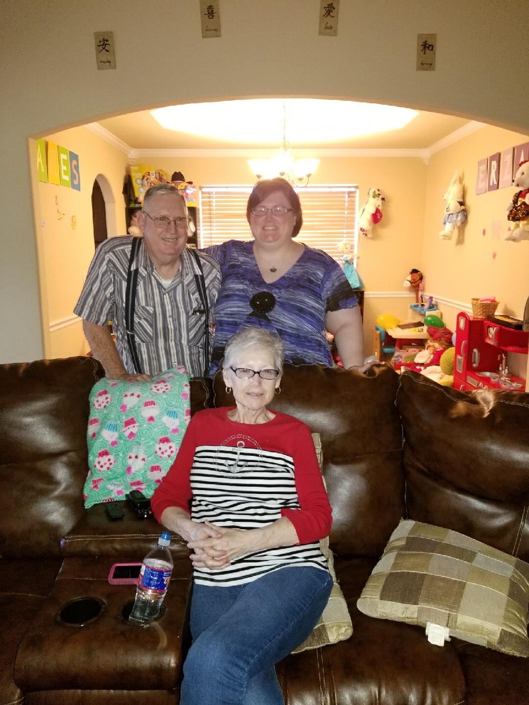 A group of people sitting on a couch