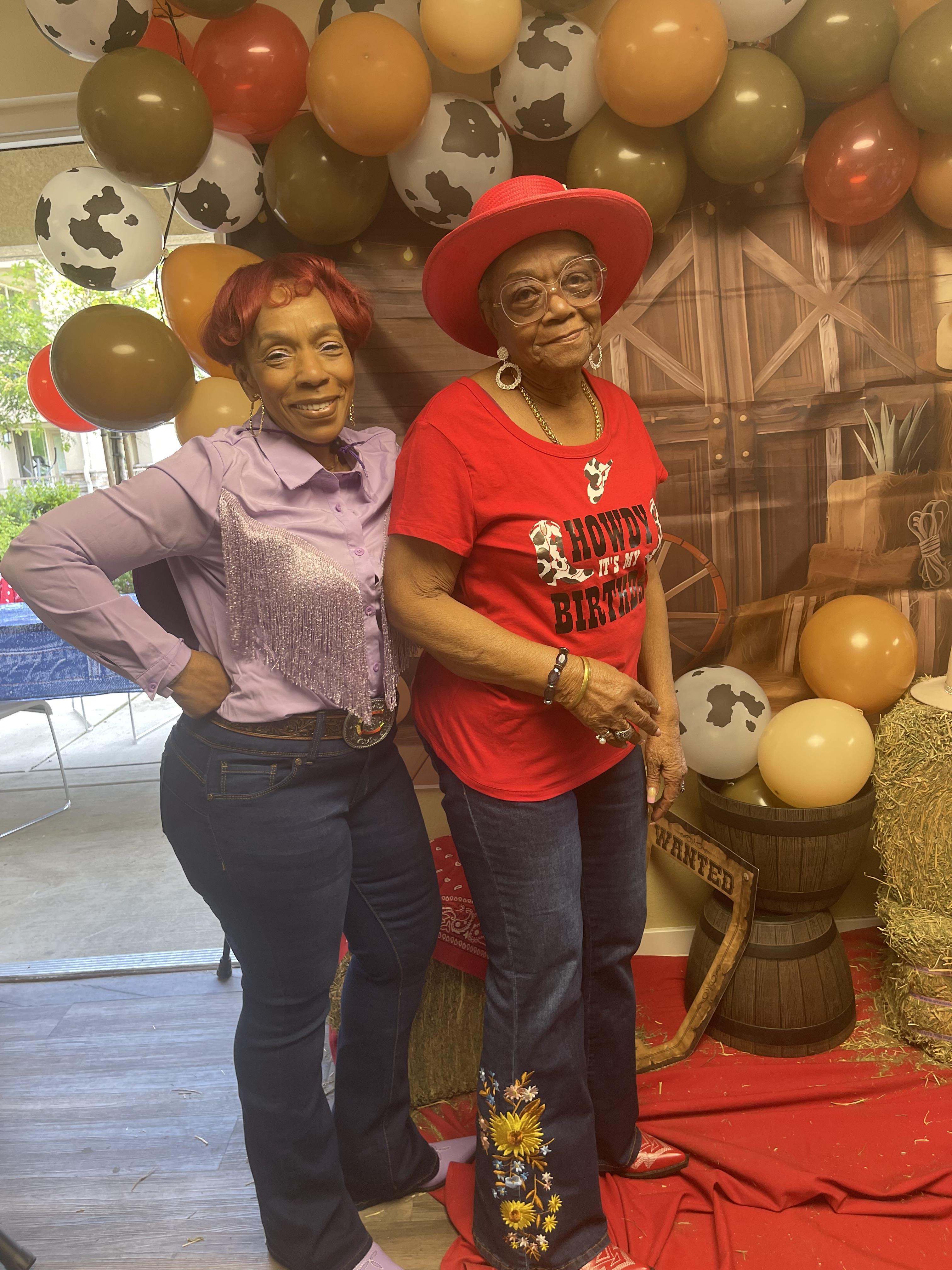 Two women standing next to each other