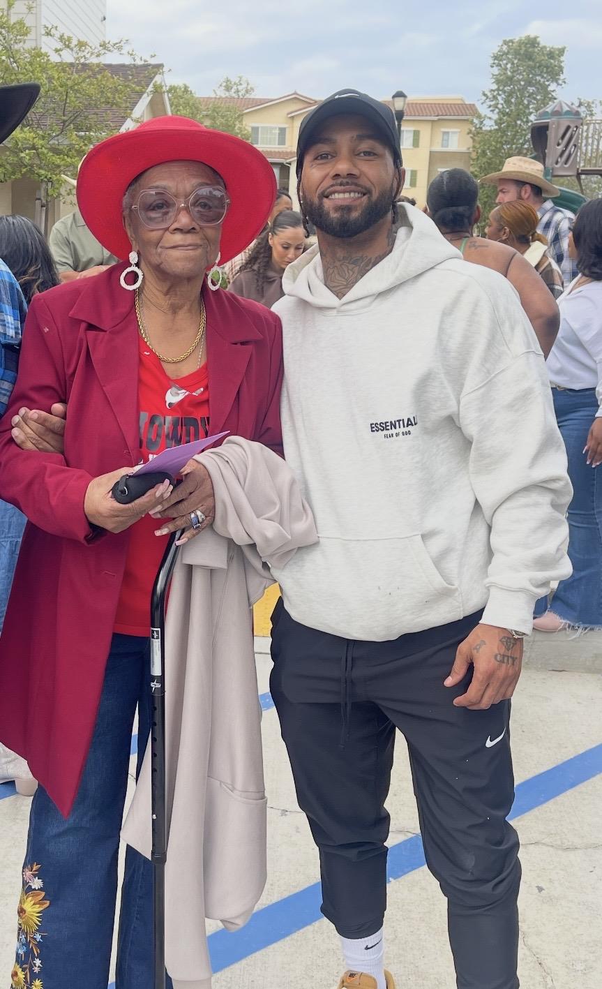 A man and woman posing for a picture
