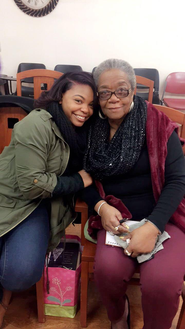 A woman and a woman sitting together