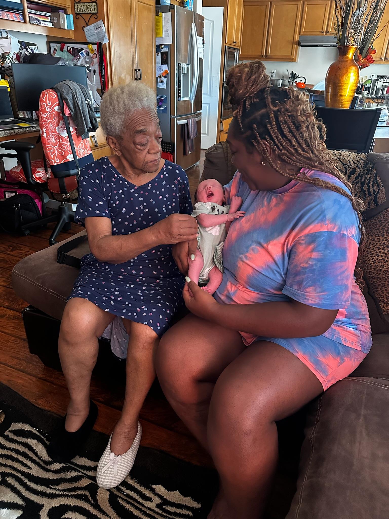 A woman holding a baby
