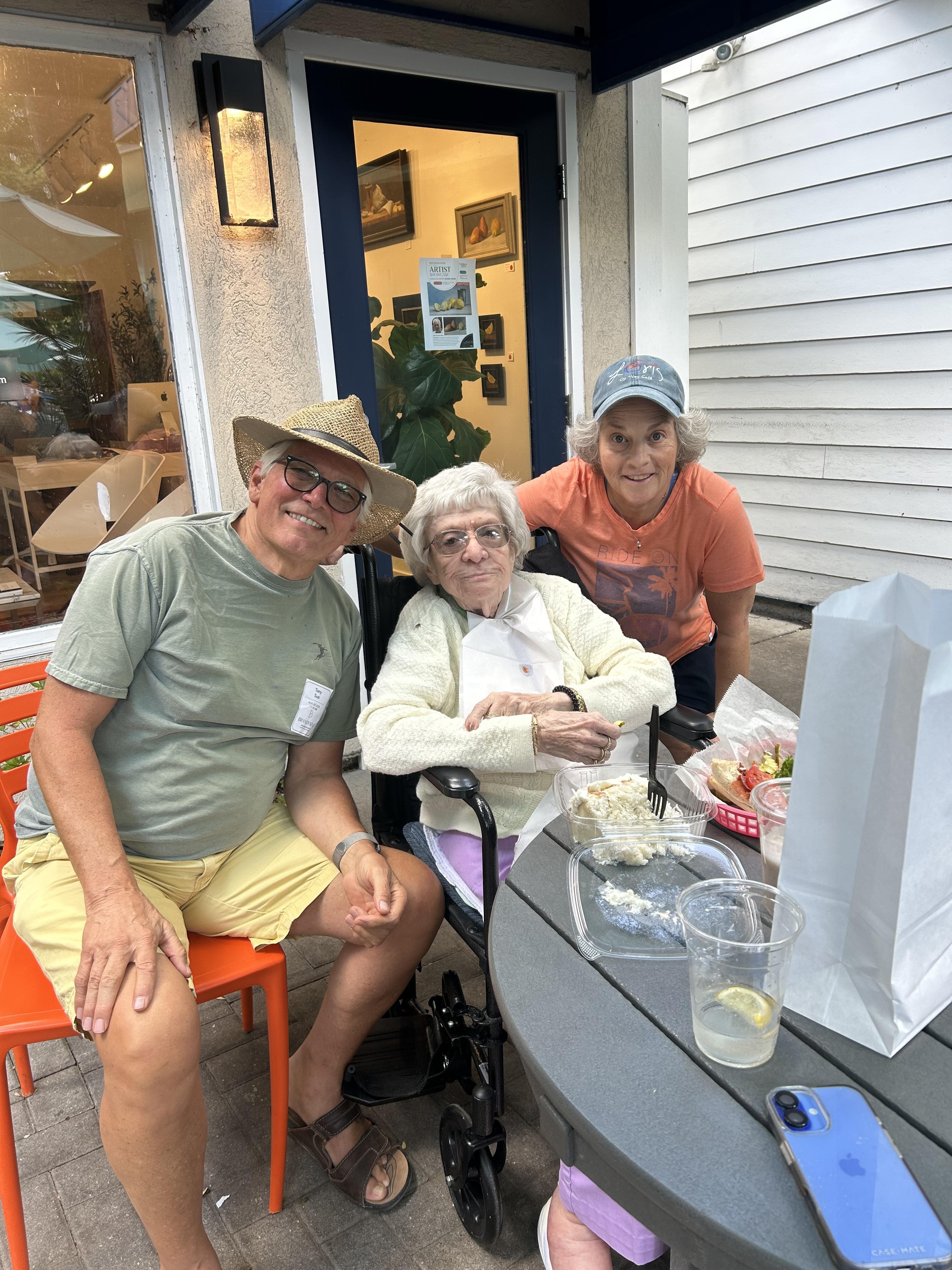 A group of people sitting at a table